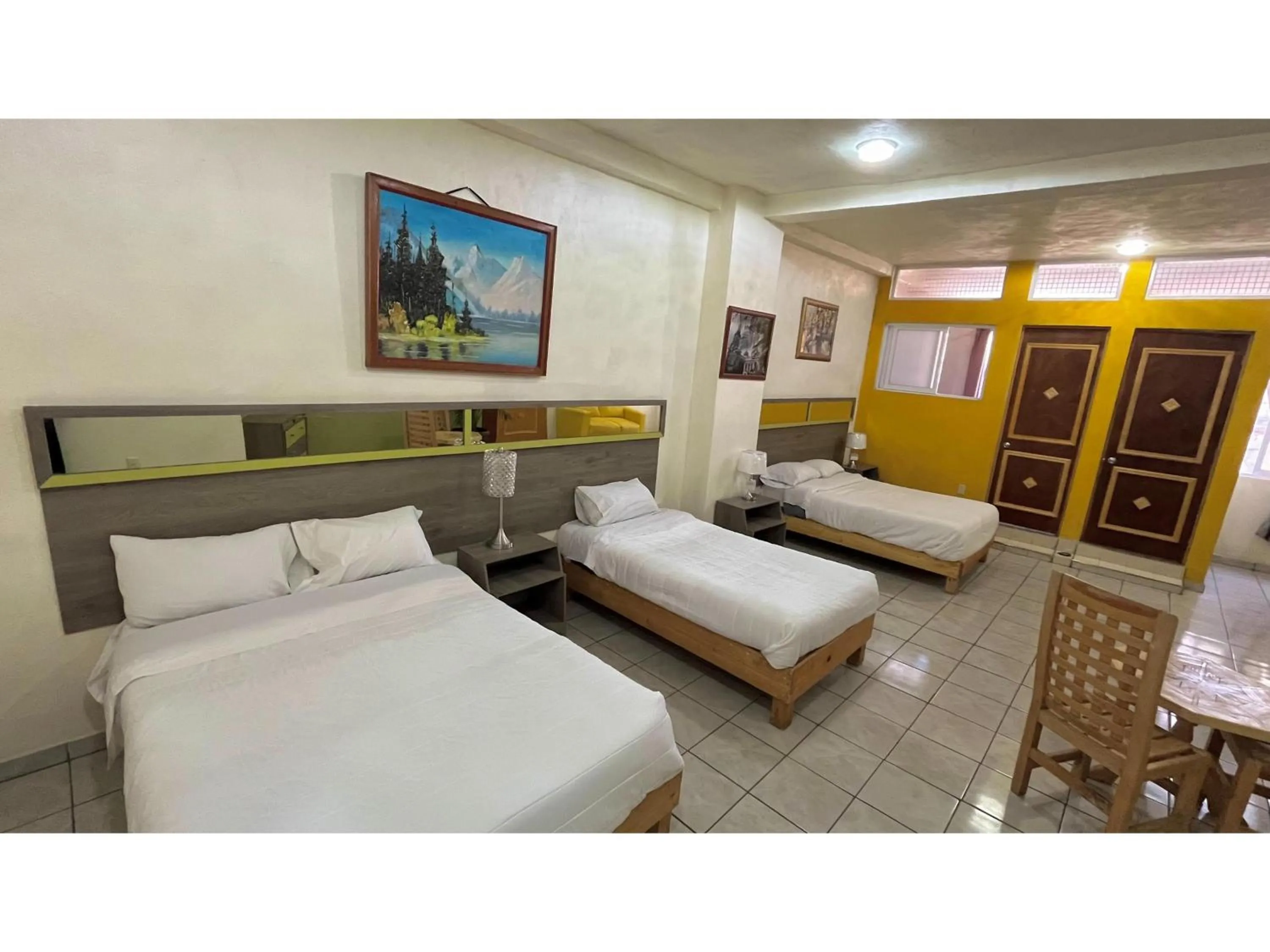 Bedroom, Bed in OYO Hotel Museo Carnaval