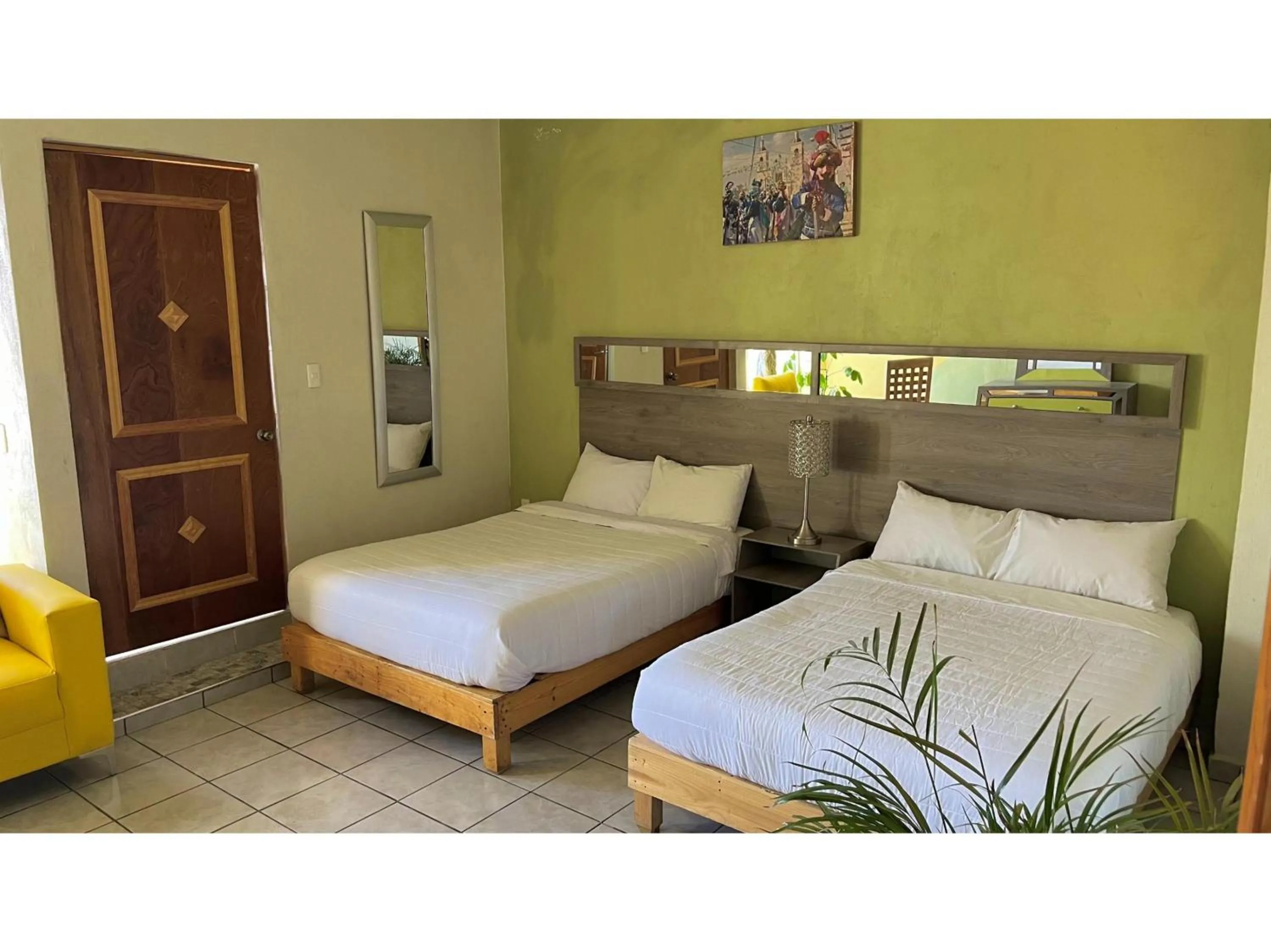 Bedroom, Bed in OYO Hotel Museo Carnaval