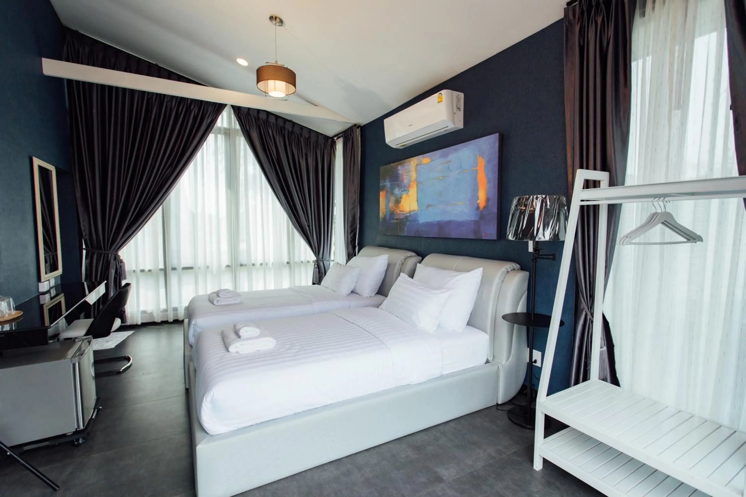 Communal lounge/ TV room, Bed in KEPT Cabana เคปท์ คาบานา