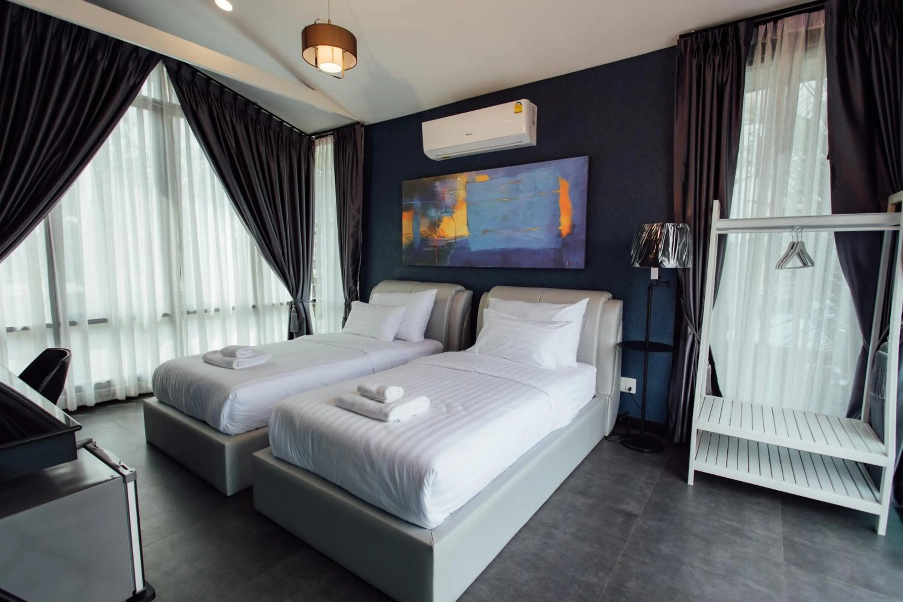 Communal lounge/ TV room, Bed in KEPT Cabana เคปท์ คาบานา