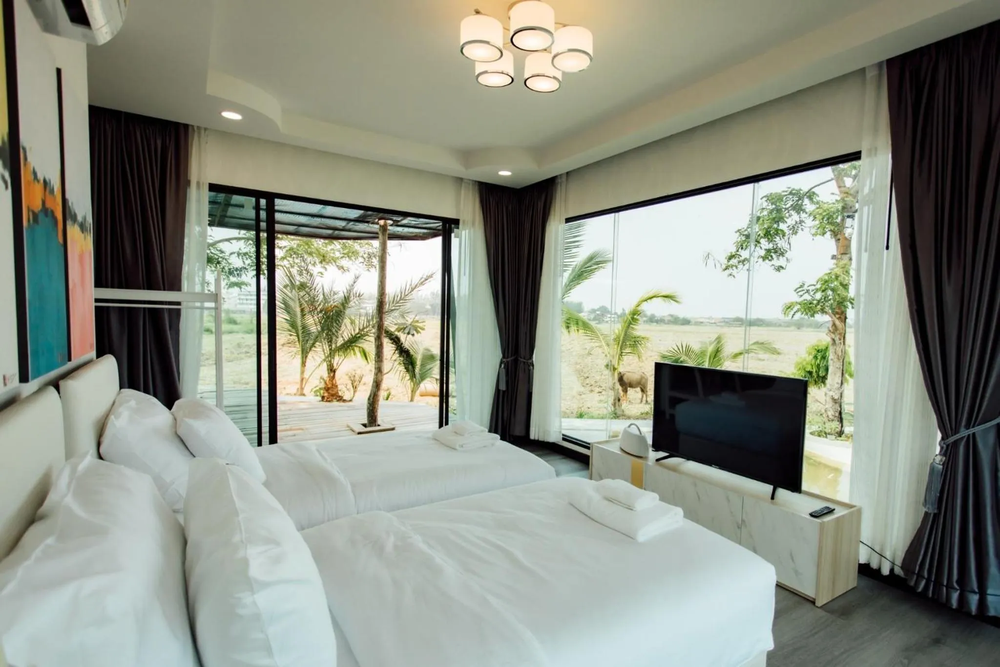 Communal lounge/ TV room, Bed in KEPT Cabana เคปท์ คาบานา