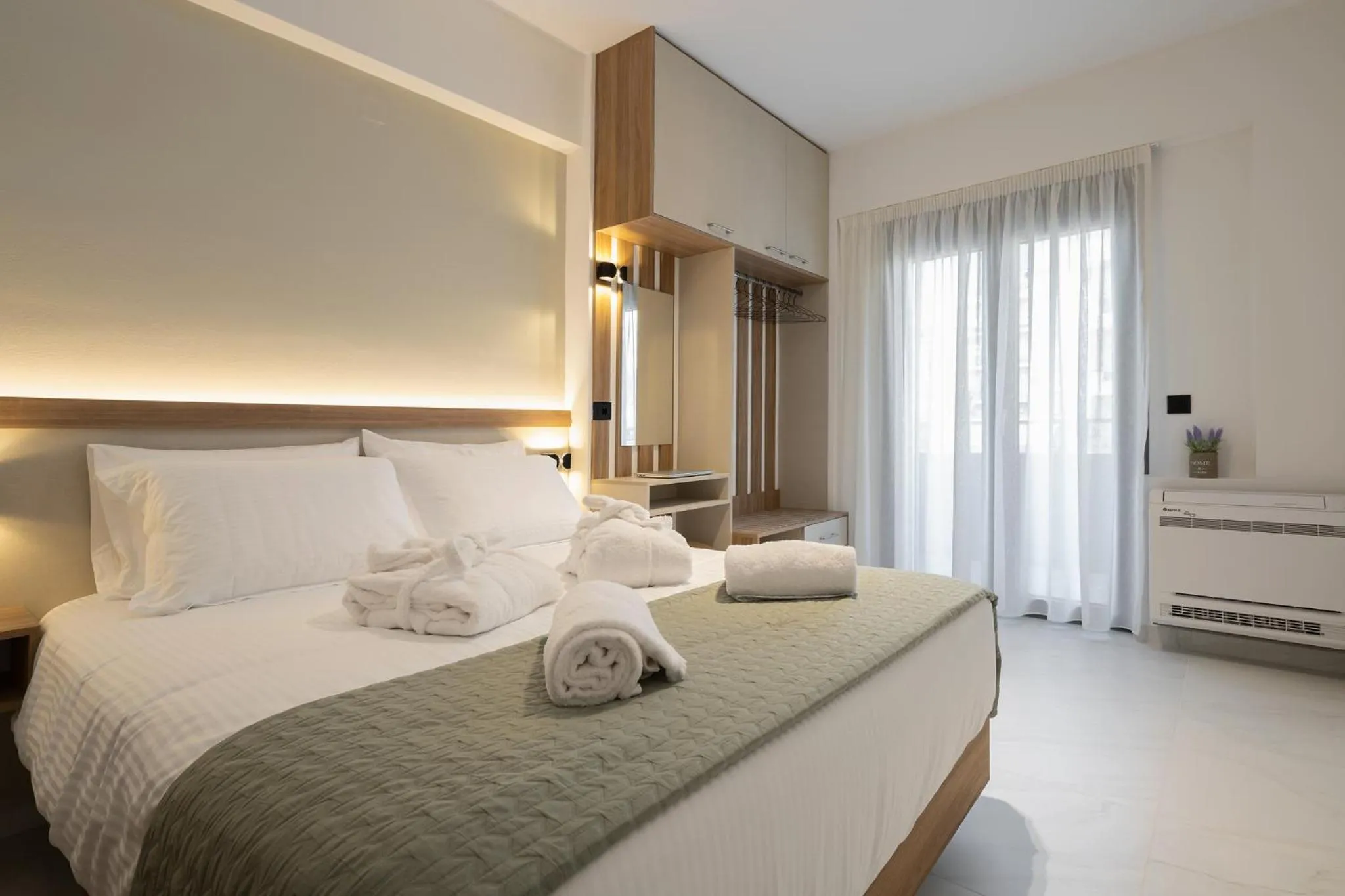 Bed in Ruby Luxury Suites