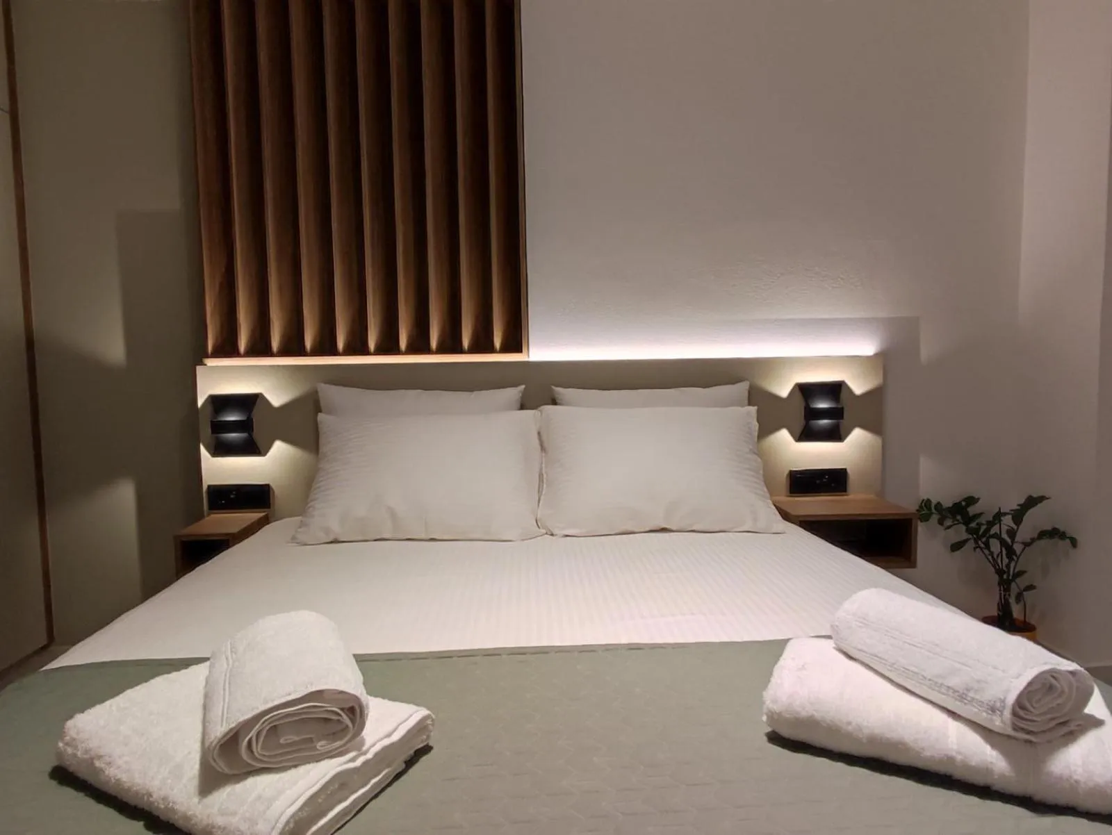 Bed in Ruby Luxury Suites