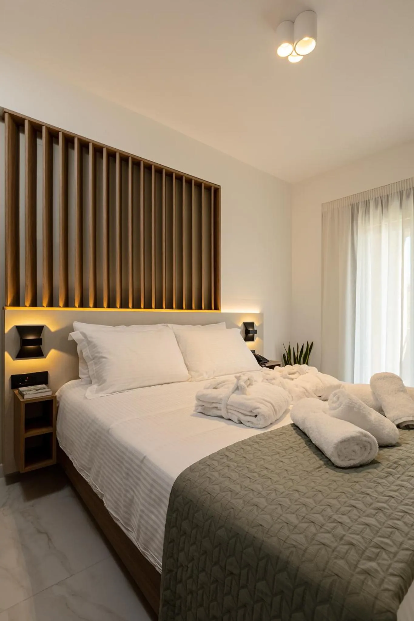 Bed in Ruby Luxury Suites