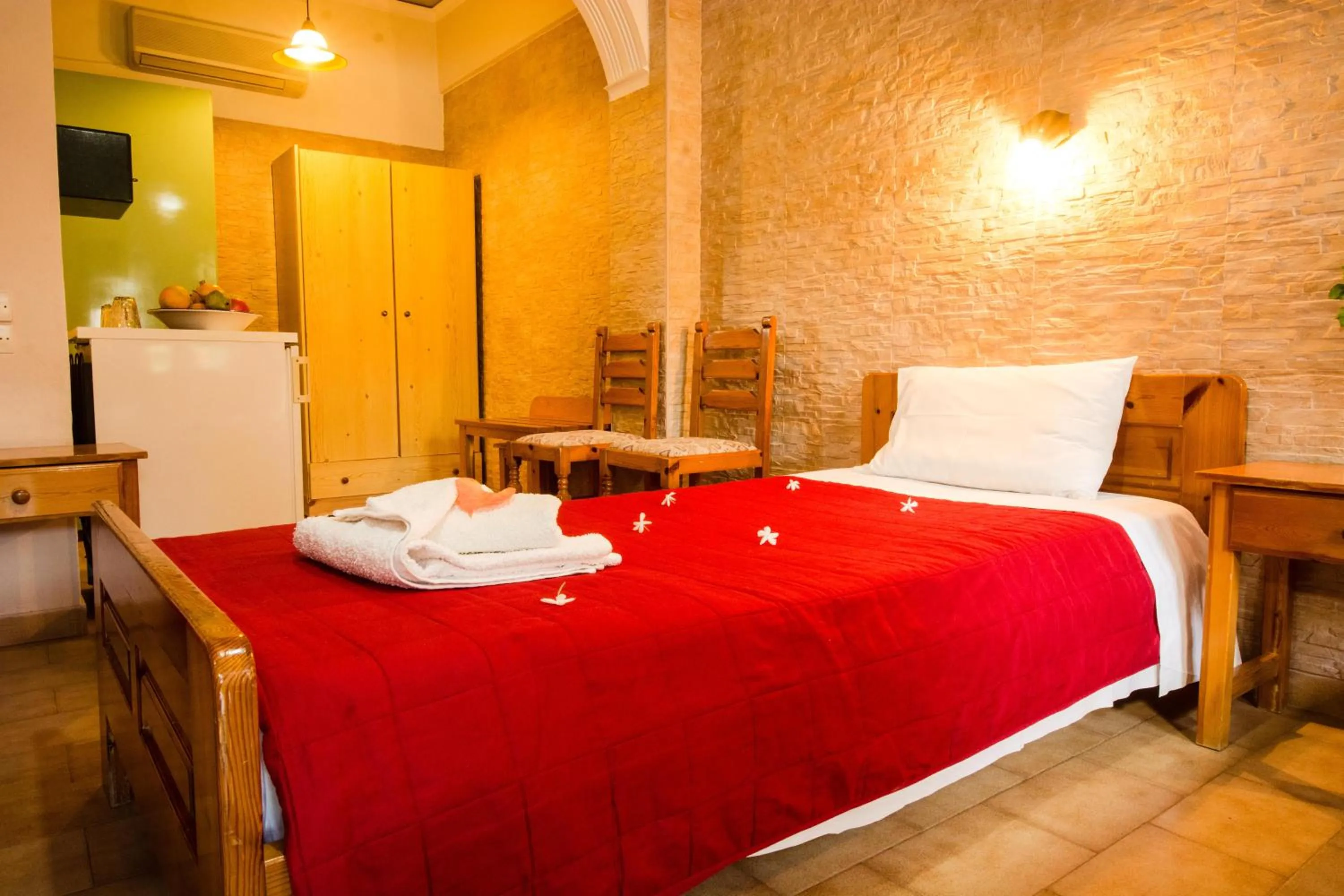 Bed in Dimitris Villa Hotel