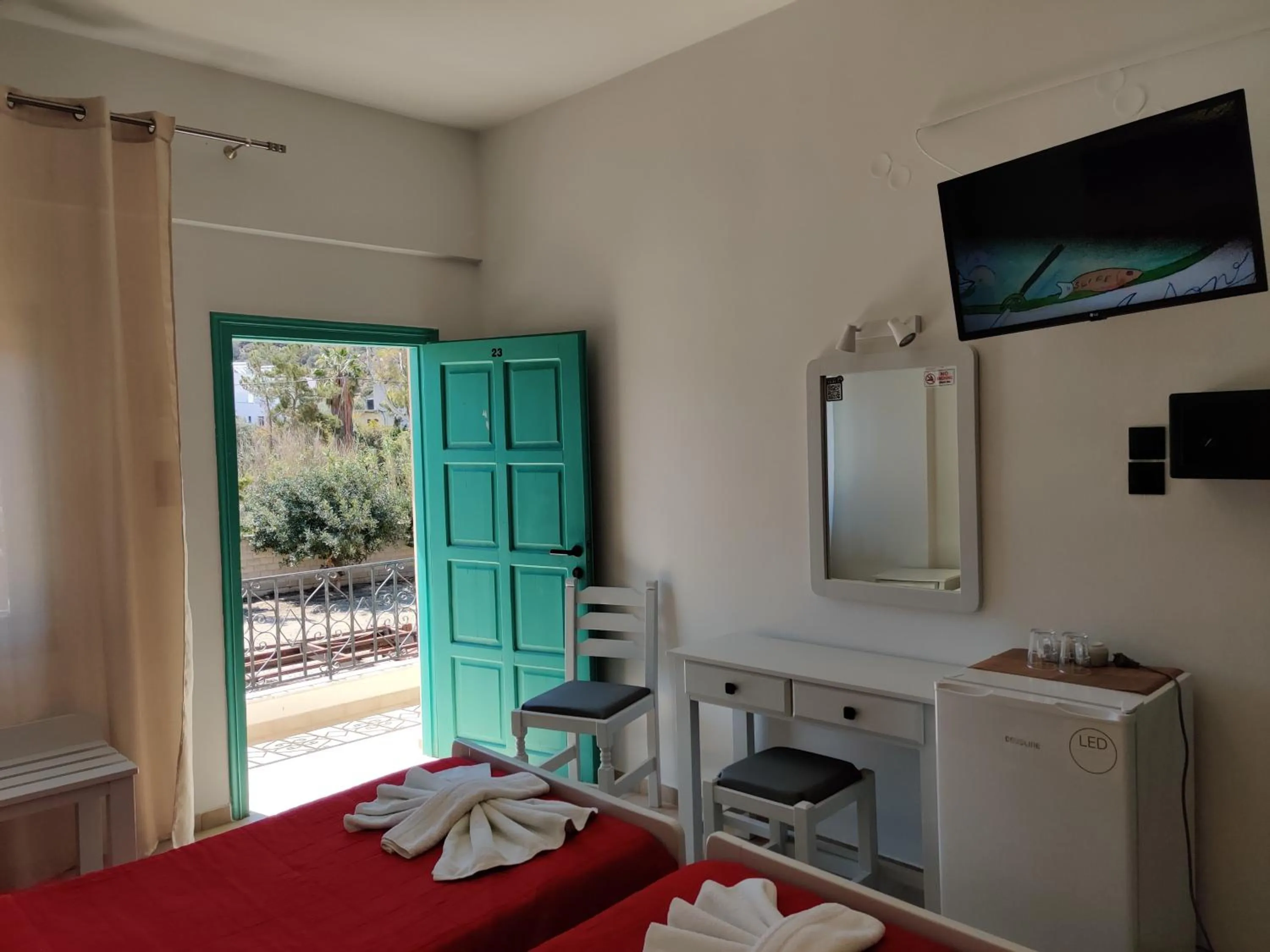 Bed in Dimitris Villa Hotel