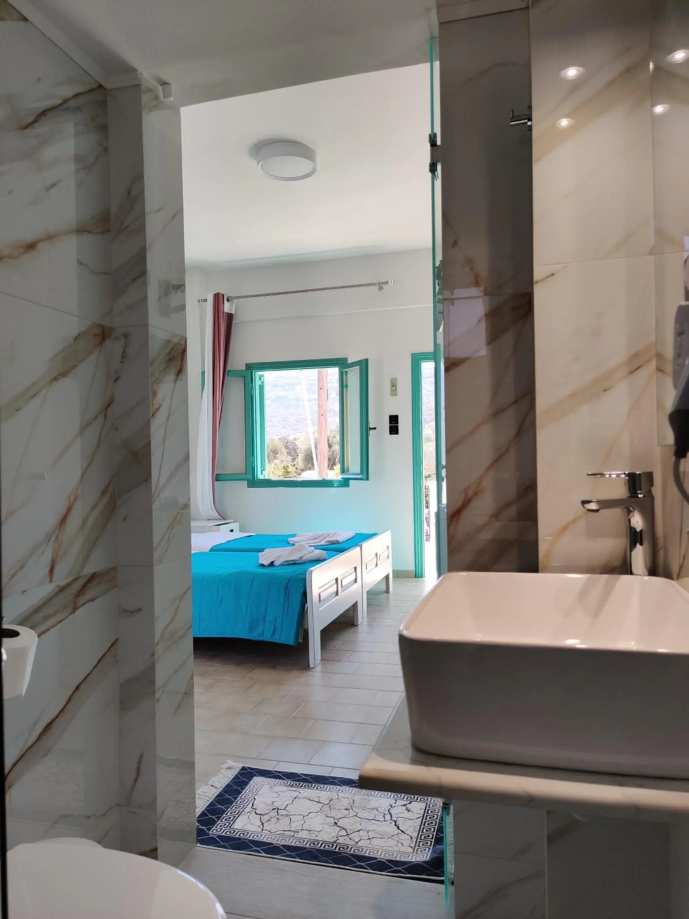 Bed in Dimitris Villa Hotel