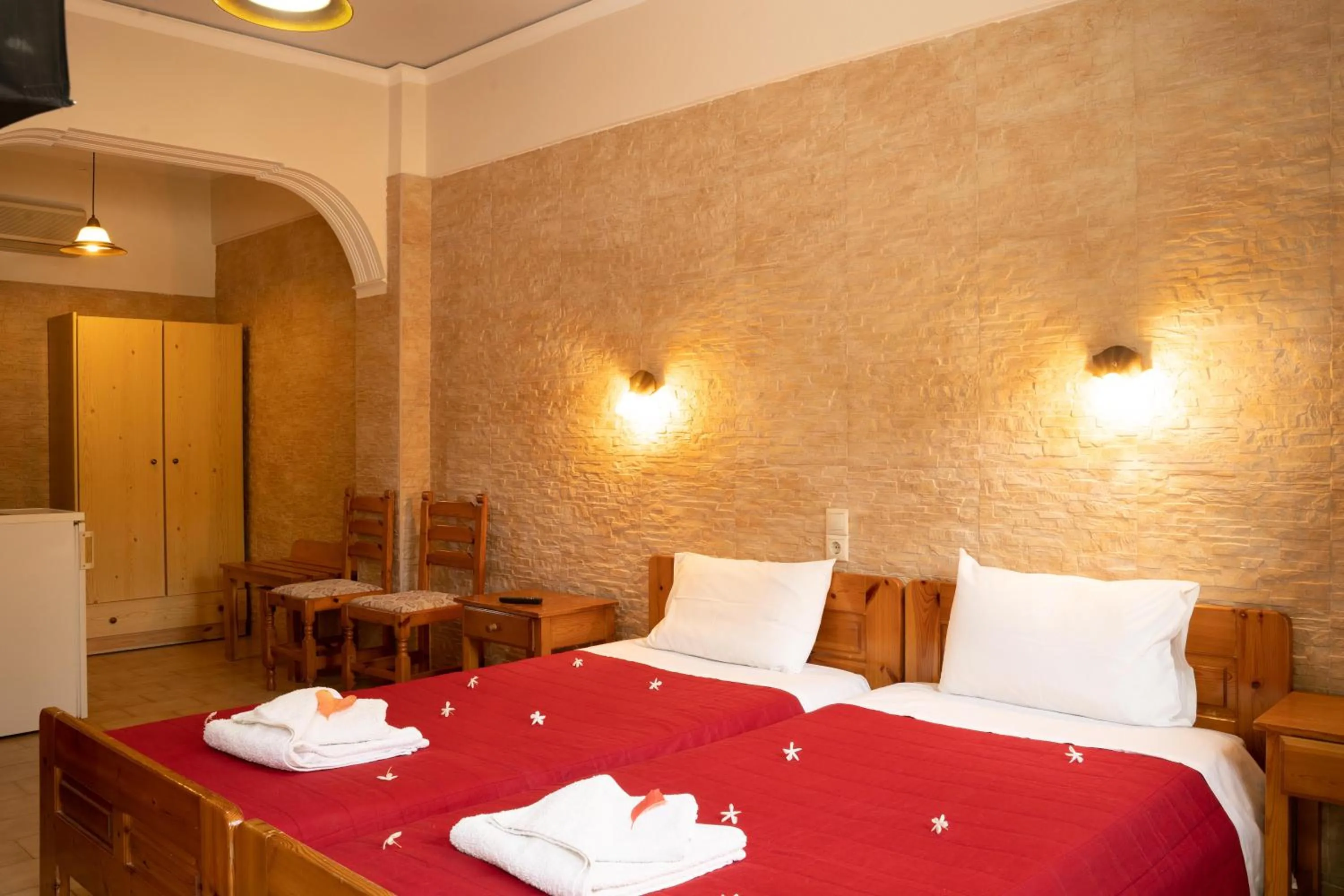 Bed in Dimitris Villa Hotel