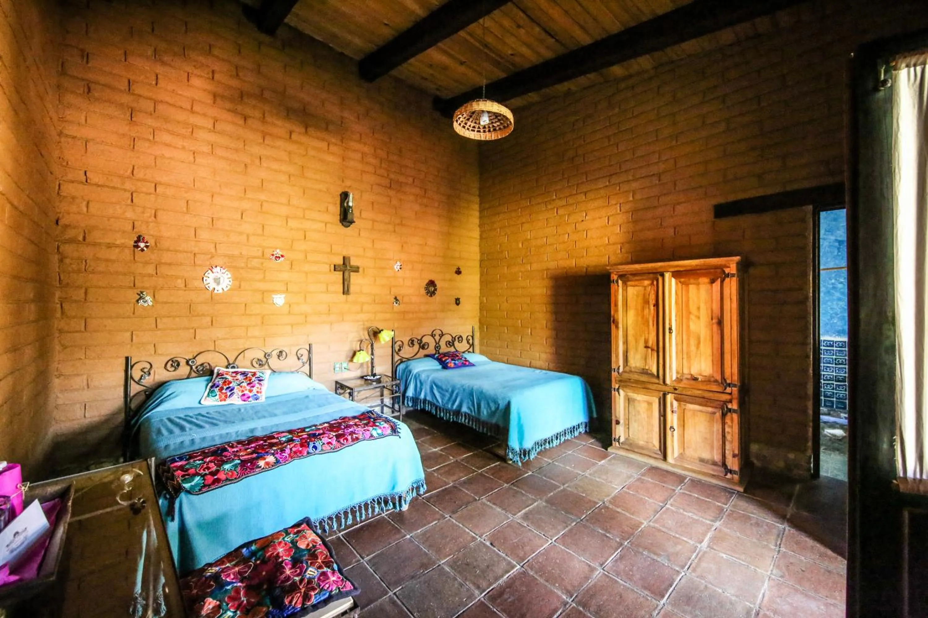 Bed in Huayápam Yù'ú Lodge