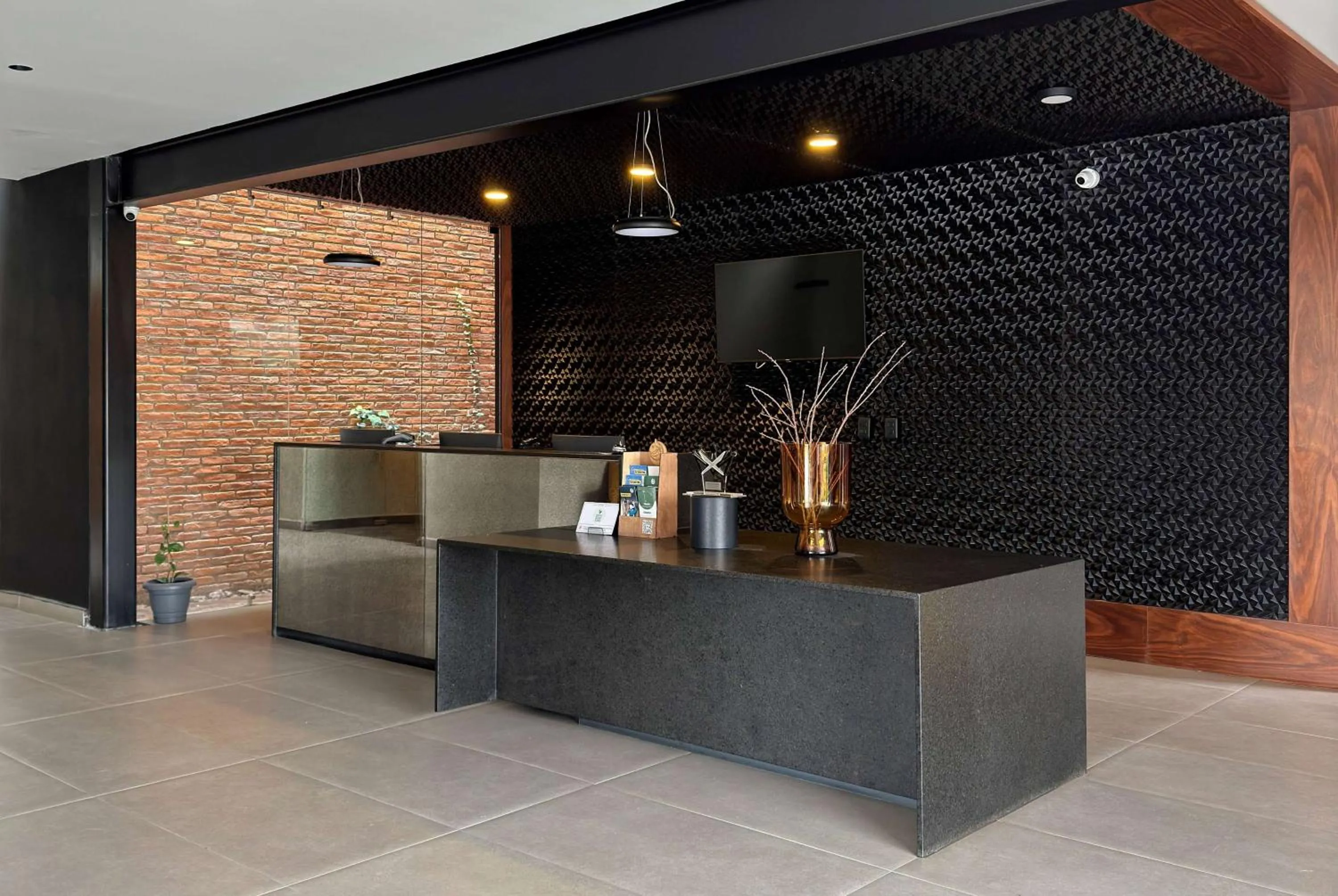 Lobby or reception in Esplendor by Wyndham San Luis Potosi
