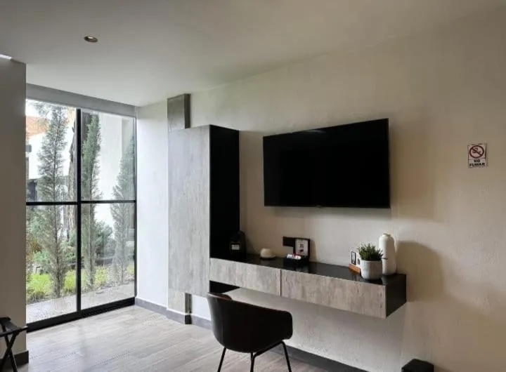 TV and multimedia in Esplendor by Wyndham San Luis Potosi