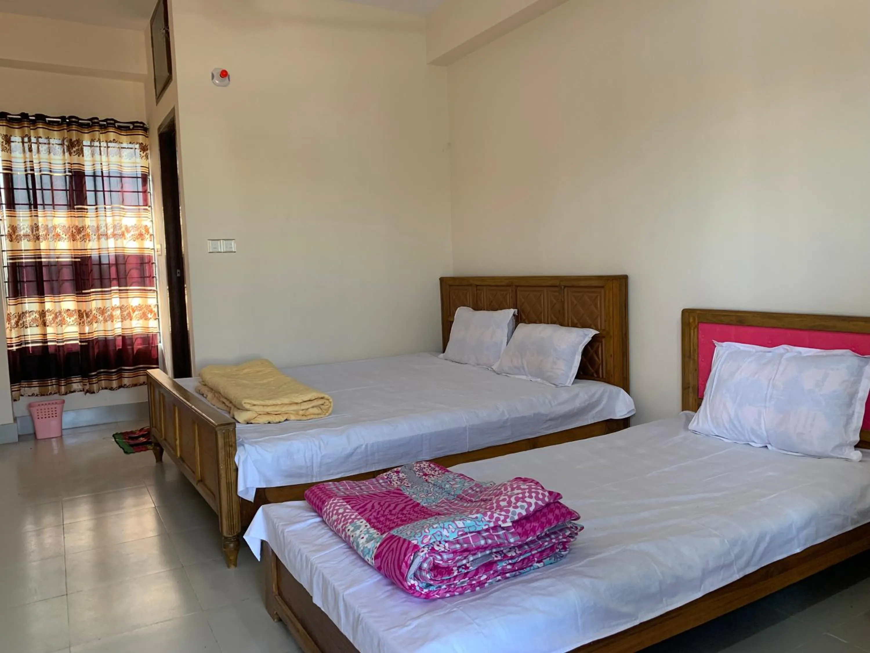 Bed in Hotel Grand Brothers