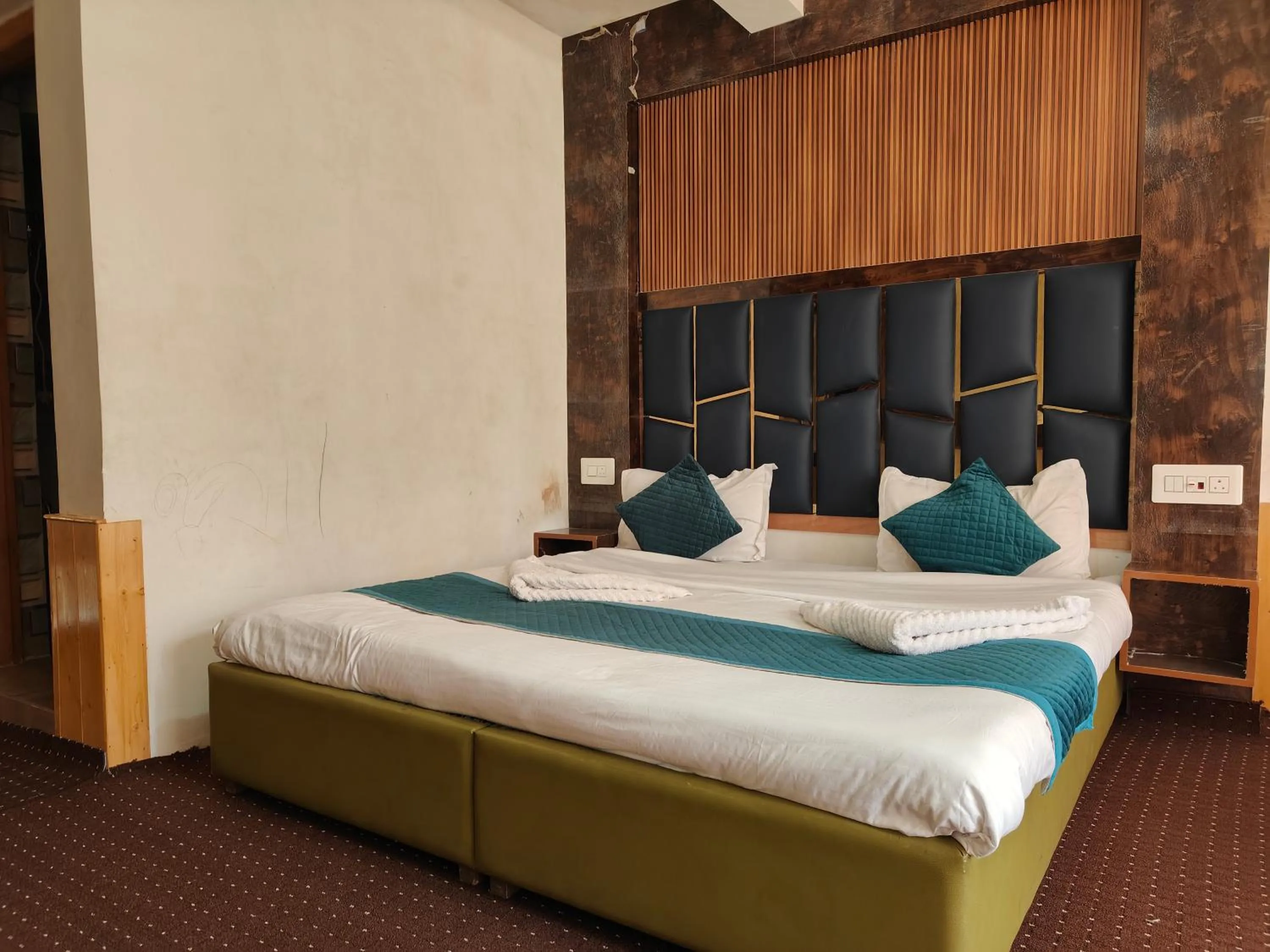 Bed in Gulsitara Resorts-Gulmarg