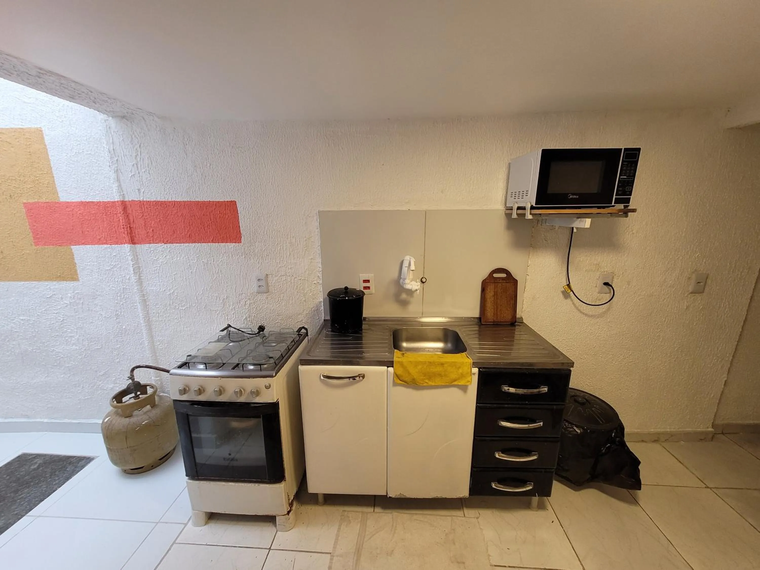 Communal kitchen in Self Hostel