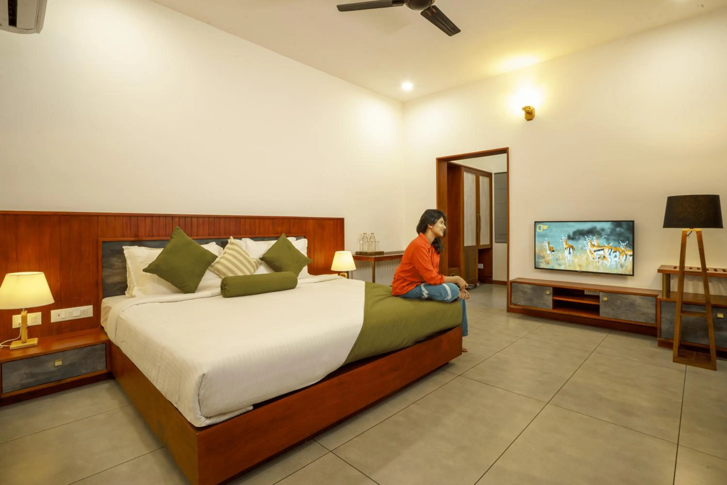 Bed in Crystal Kuruva Nature Resort & Spa