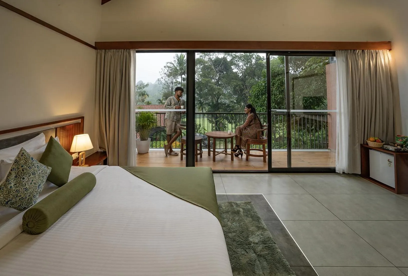 Bed in Crystal Kuruva Nature Resort & Spa