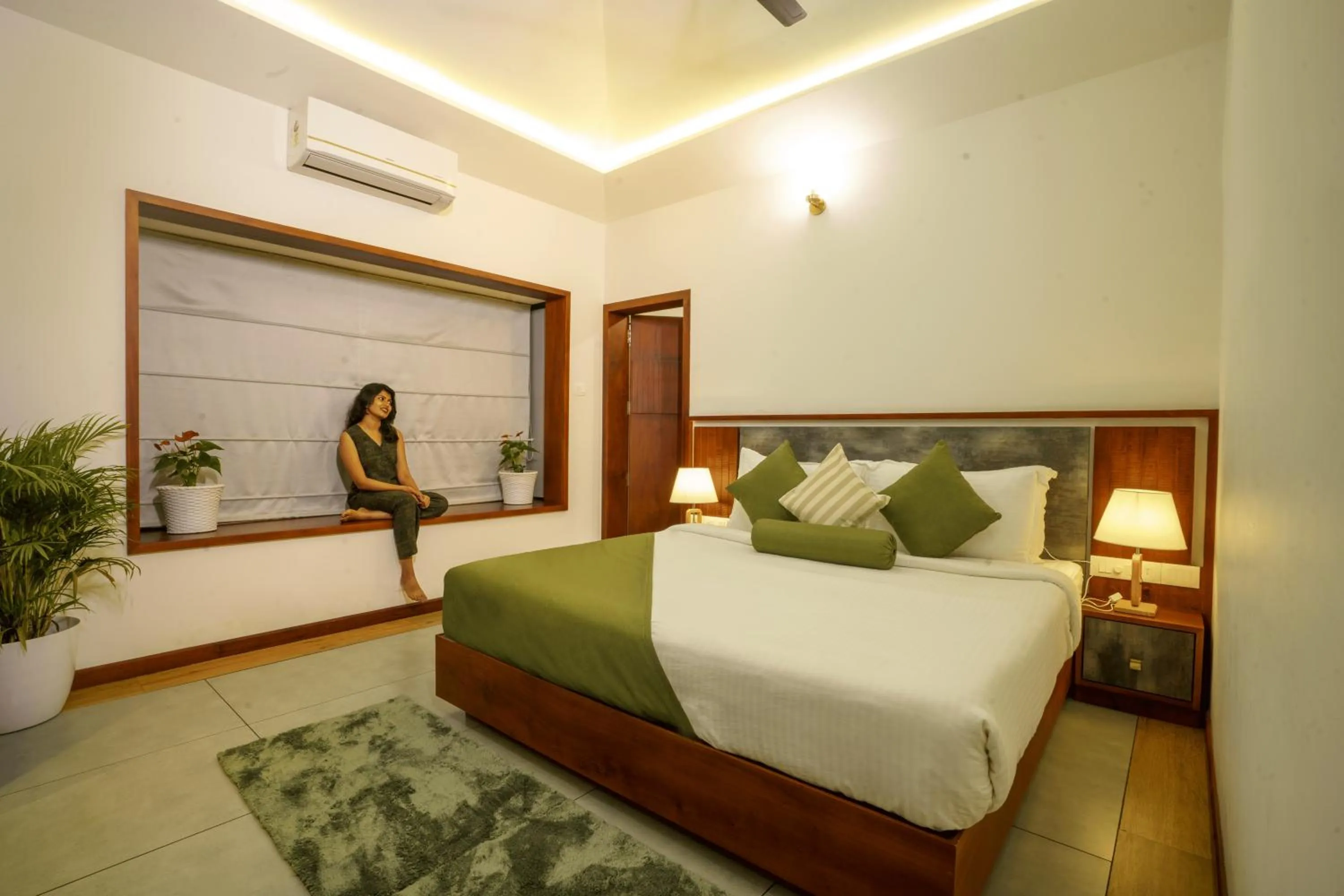 Bed in Crystal Kuruva Nature Resort & Spa