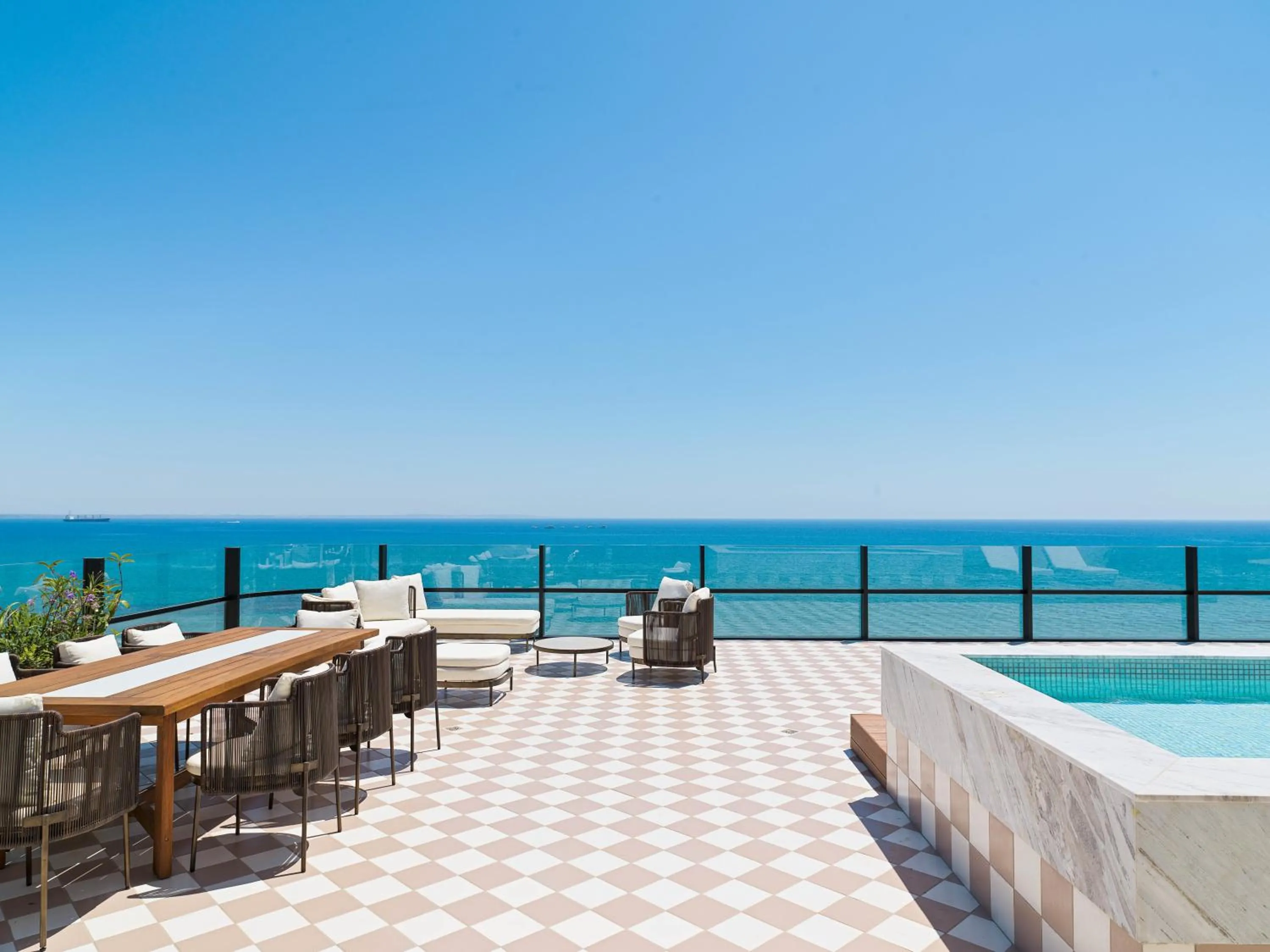 Seating area in LIV Mackenzie Beach Suites Larnaca ADULTS ONLY