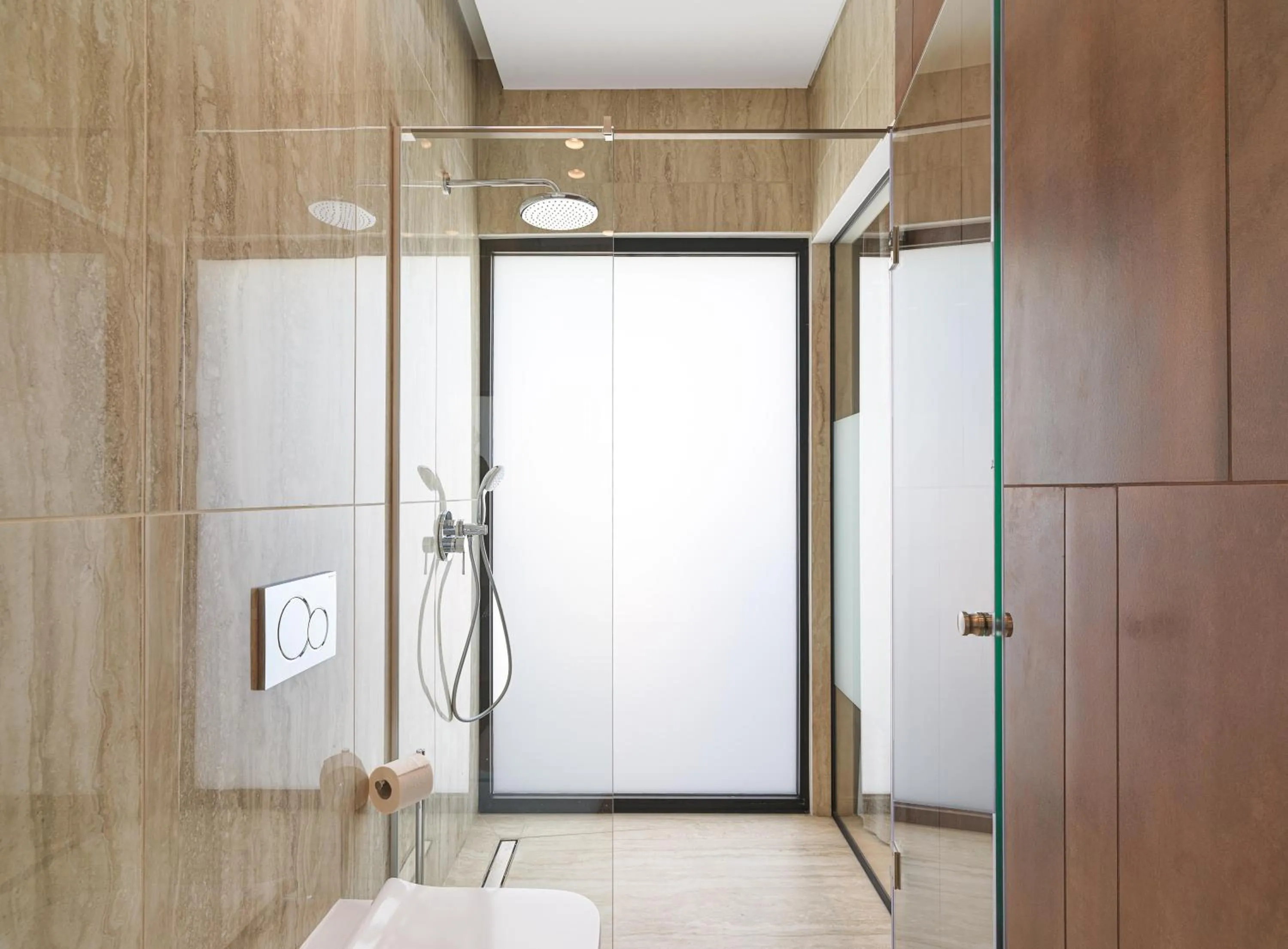 Bathroom in LIV Mackenzie Beach Suites Larnaca ADULTS ONLY