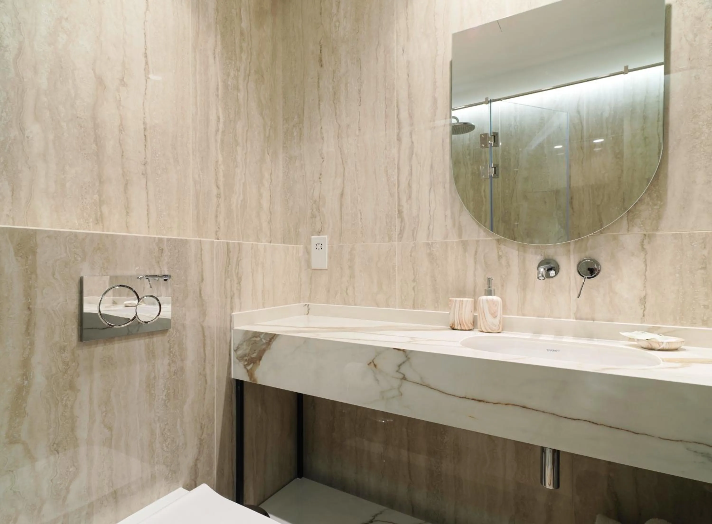 Bathroom in LIV Mackenzie Beach Suites Larnaca ADULTS ONLY