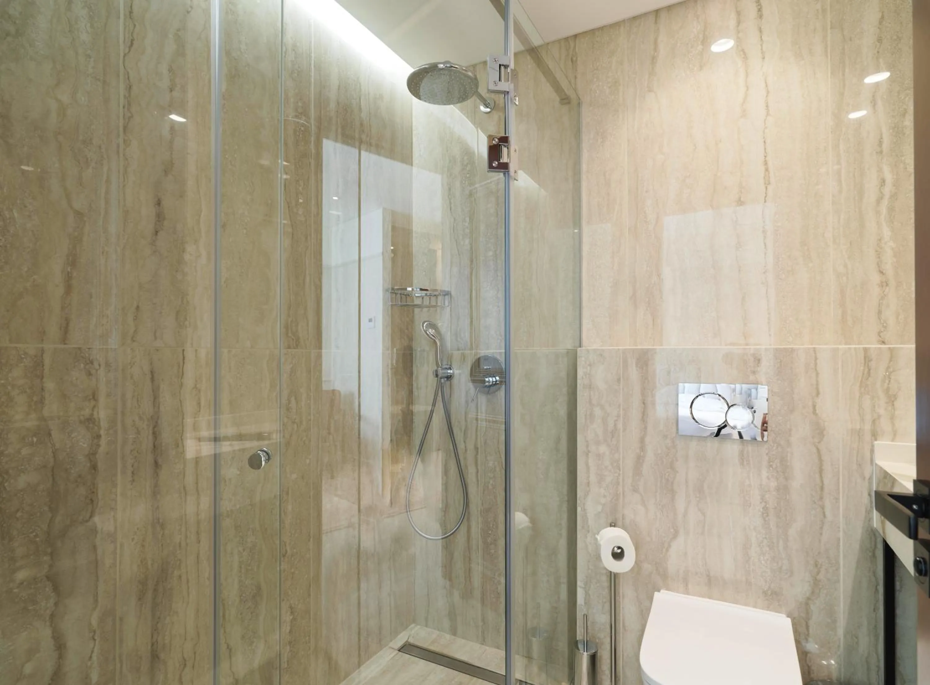 Bathroom in LIV Mackenzie Beach Suites Larnaca ADULTS ONLY