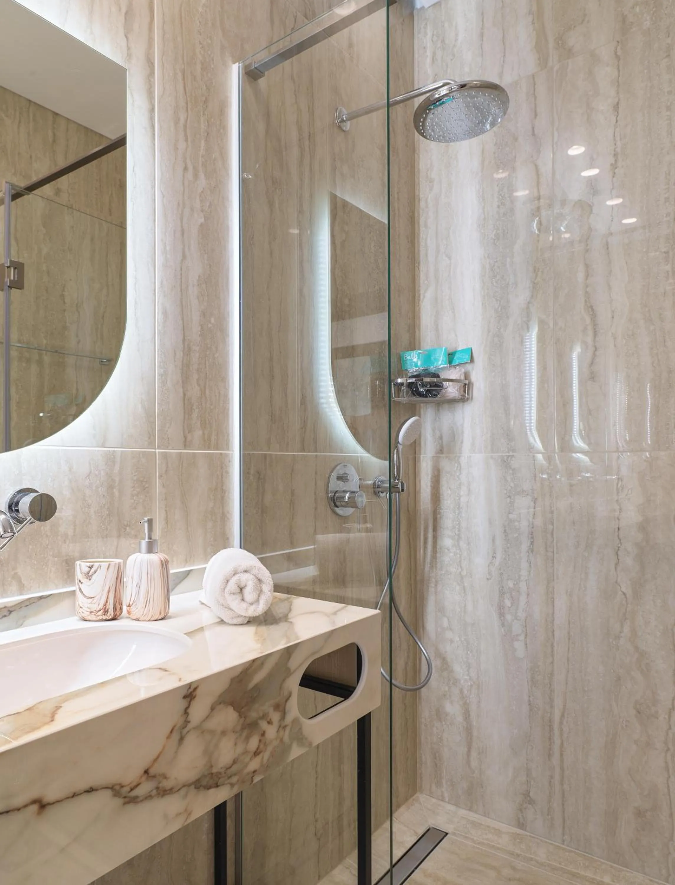 Bathroom in LIV Mackenzie Beach Suites Larnaca ADULTS ONLY