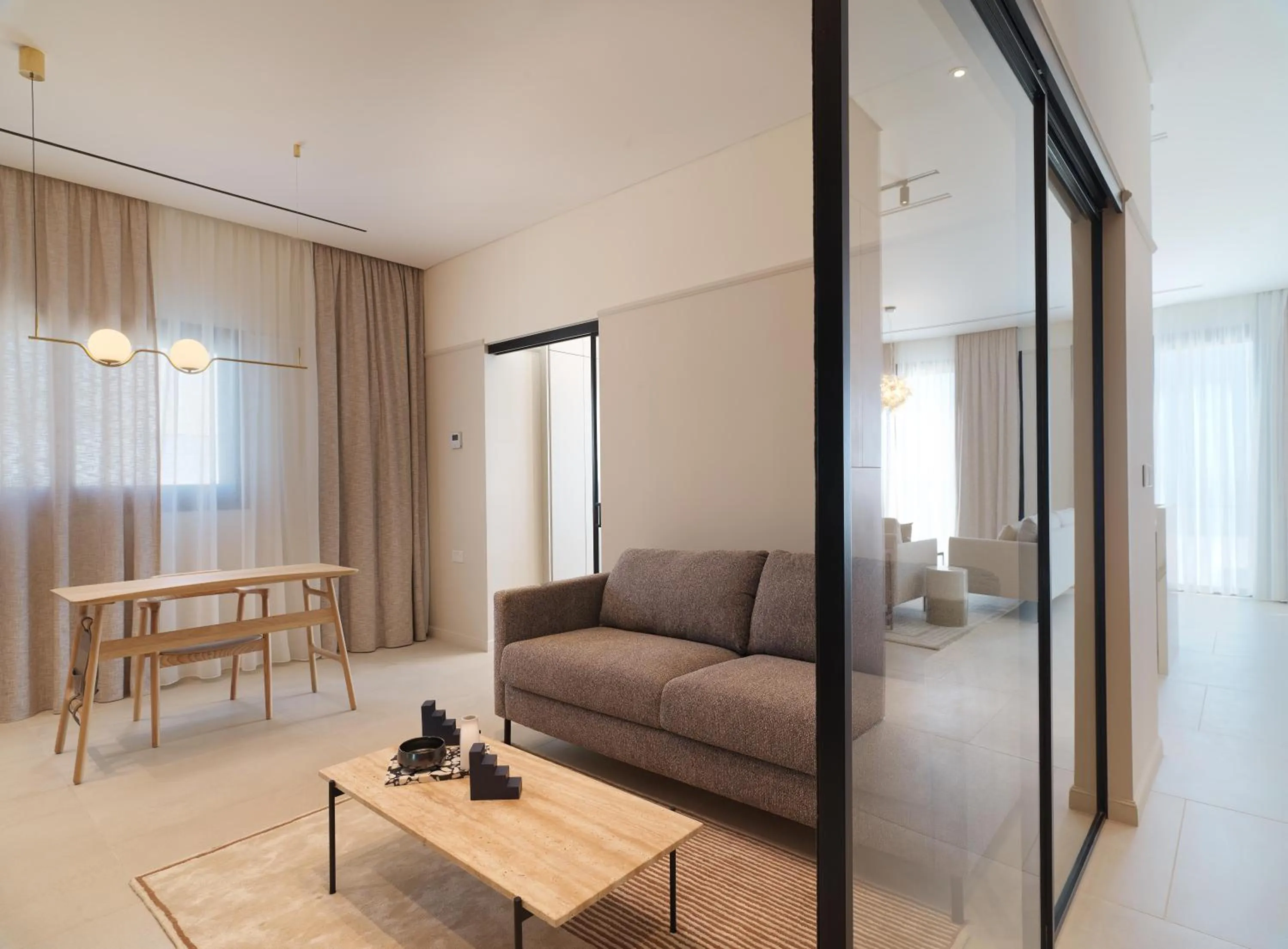 TV and multimedia in LIV Mackenzie Beach Suites Larnaca ADULTS ONLY