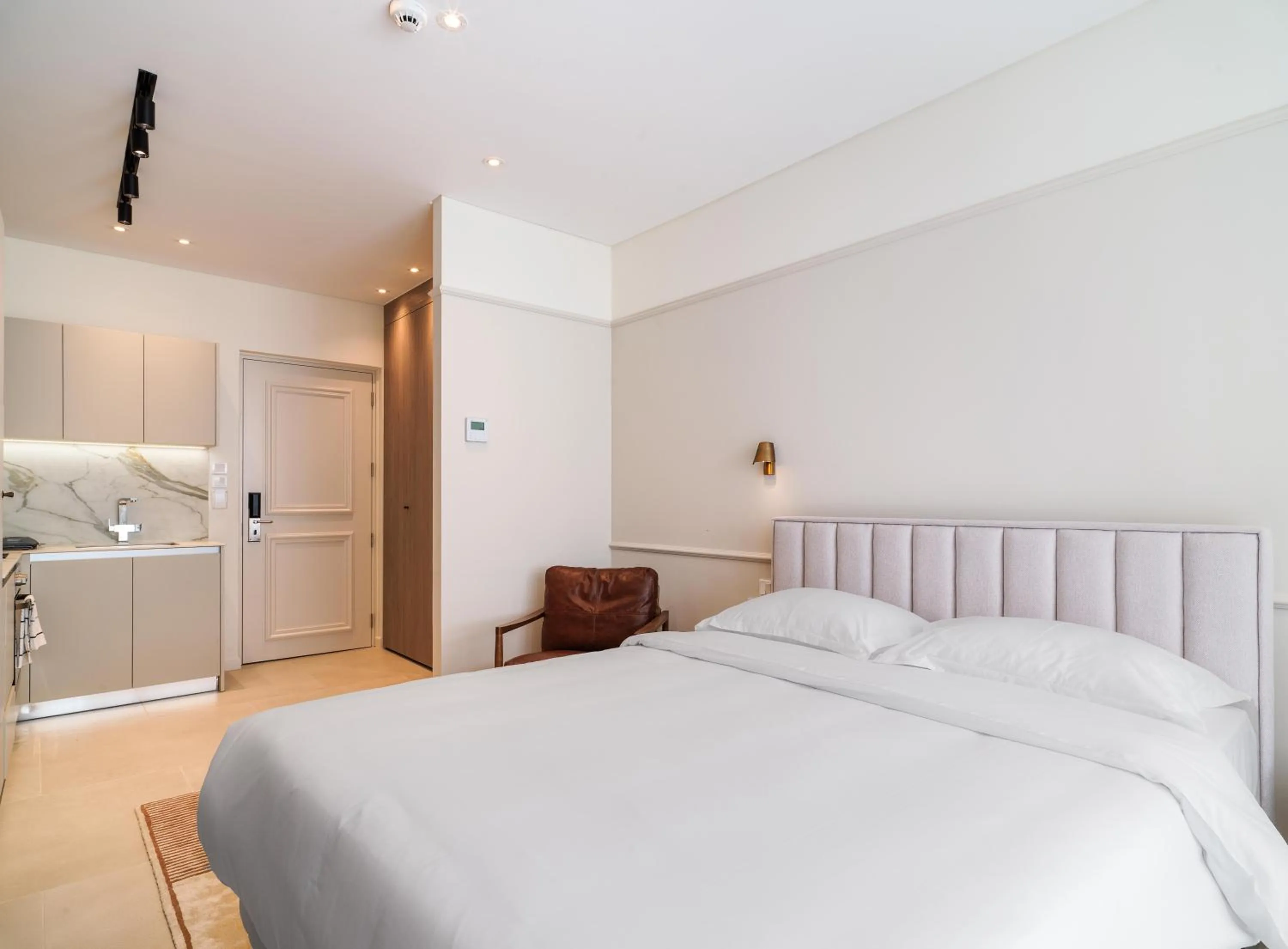 Photo of the whole room, Bed in LIV Mackenzie Beach Suites Larnaca ADULTS ONLY