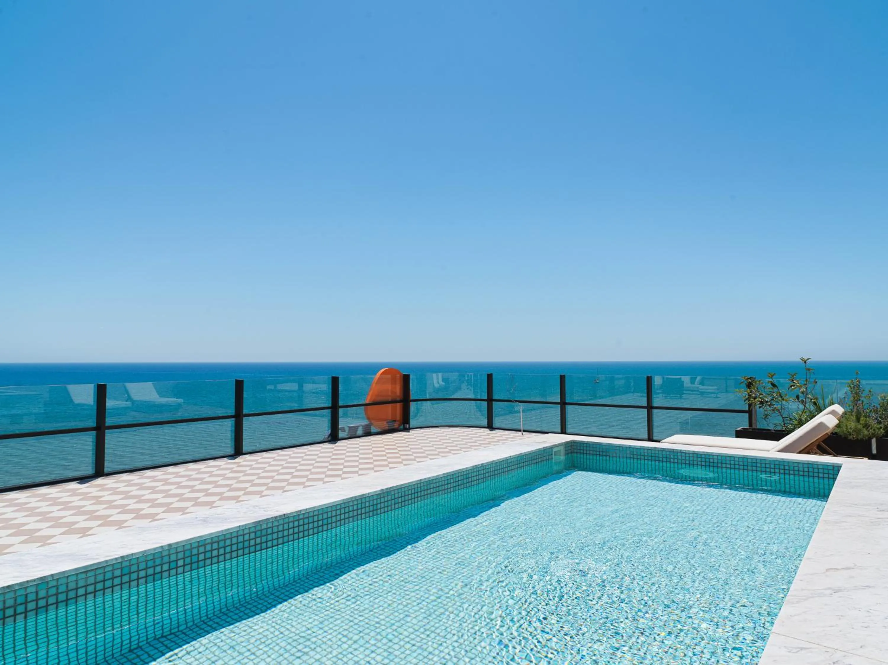 Pool view in LIV Mackenzie Beach Suites Larnaca ADULTS ONLY