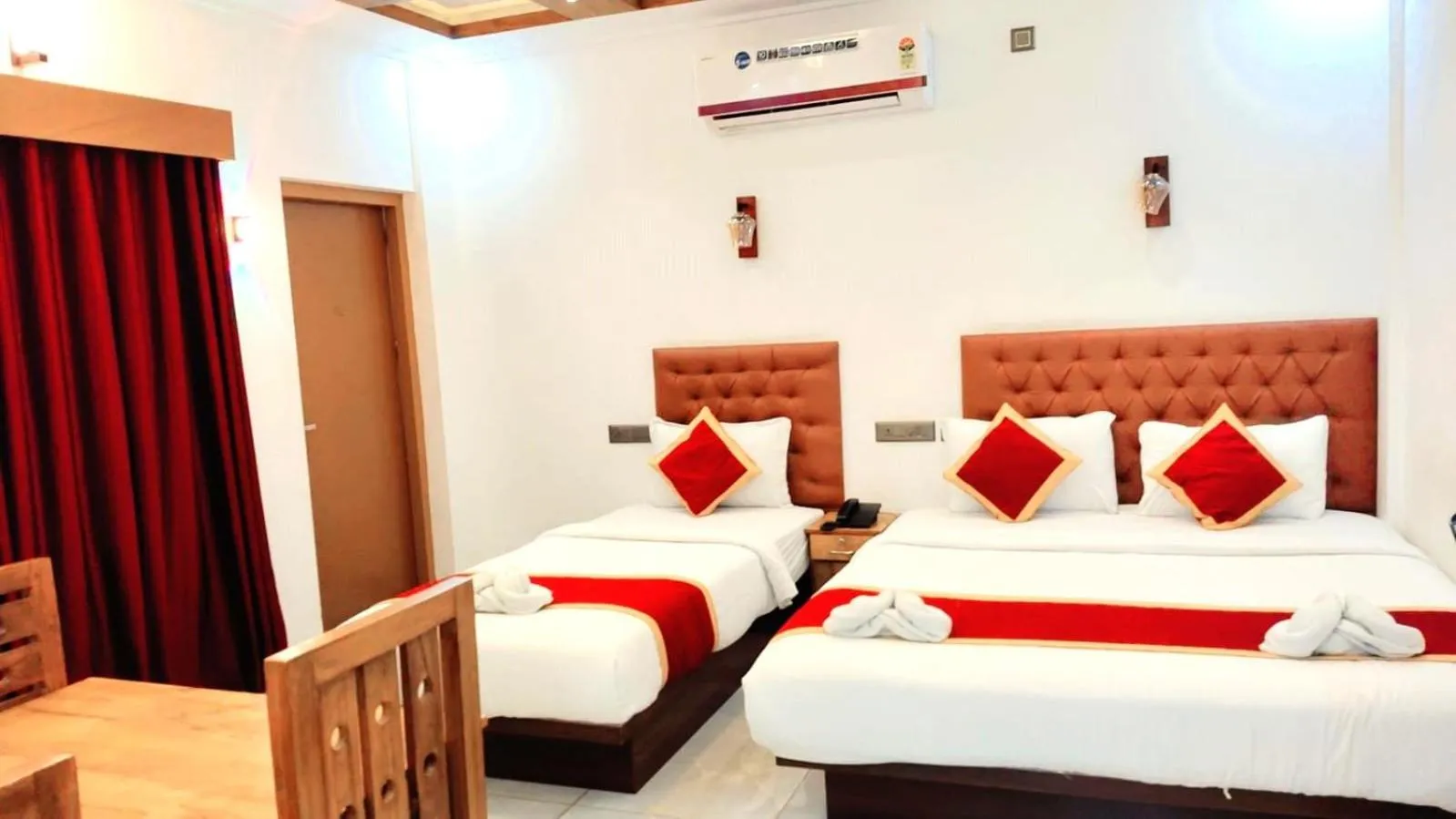 Bed in MARINA SUITES AIRPORT HOTEL