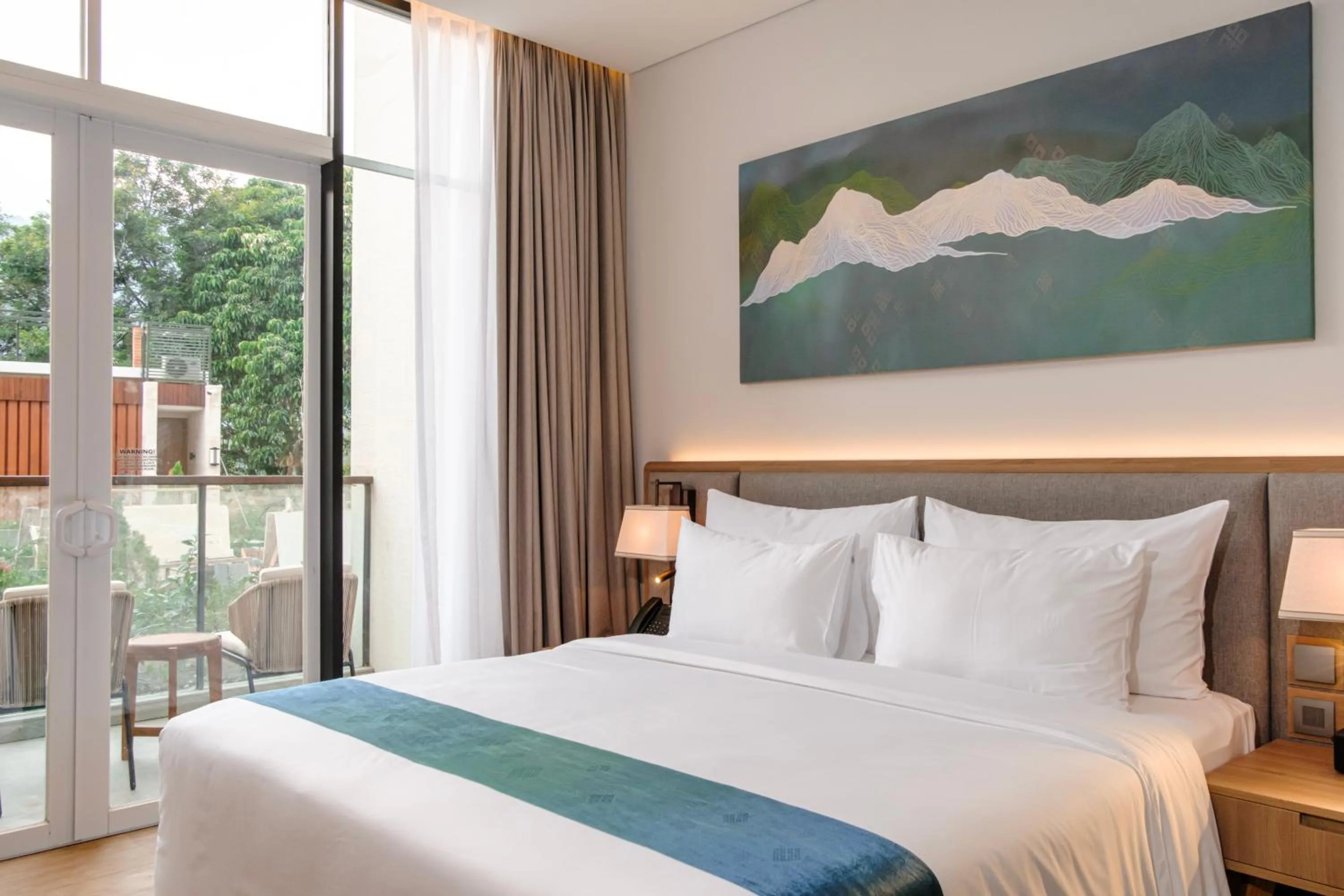 Bedroom, Bed in Marianna Resort And Convention Tuktuk - Samosir, Marclan Collection