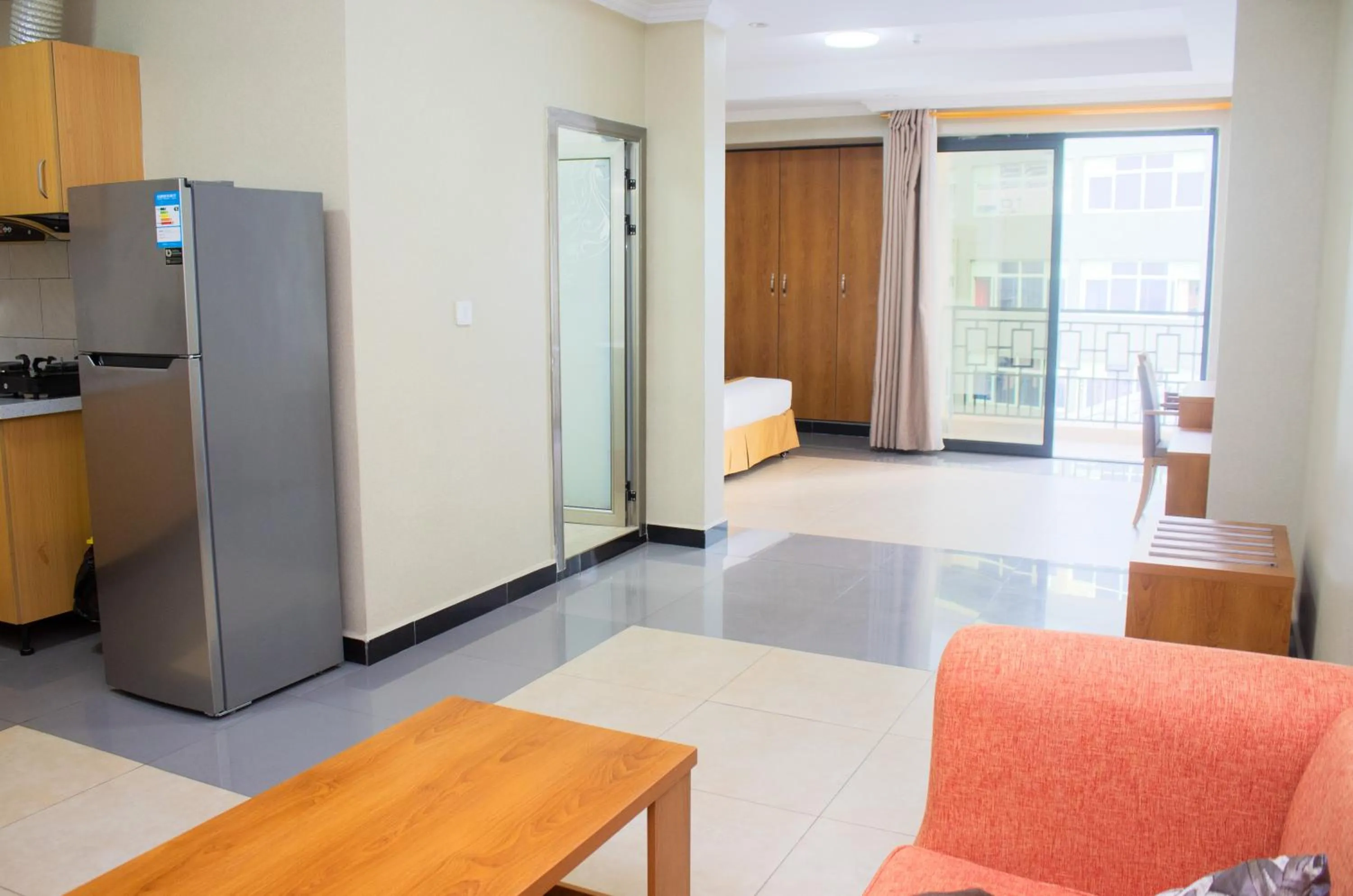 Living room in Tropical Plaza Apartments