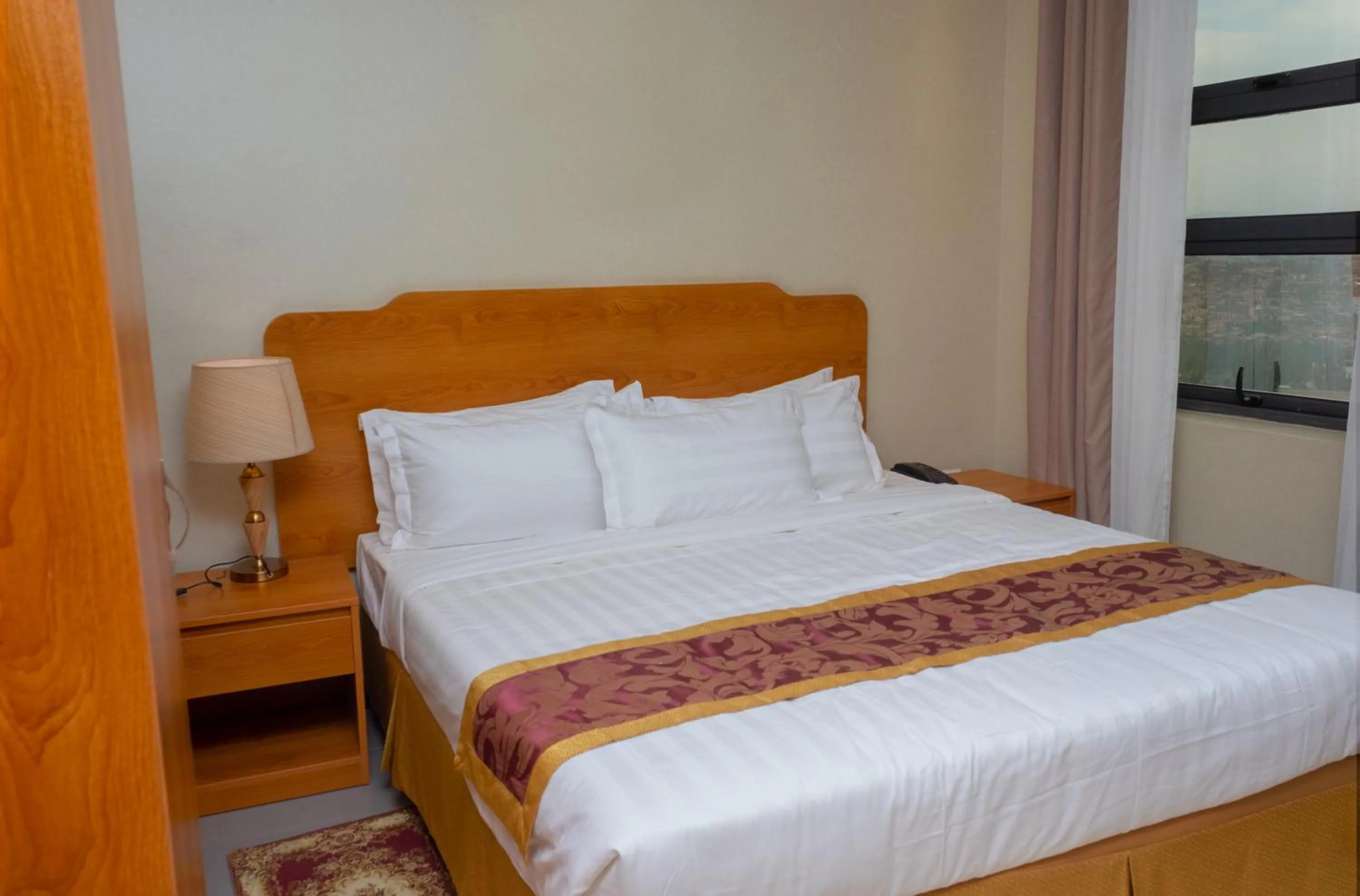 Bedroom in Tropical Plaza Apartments