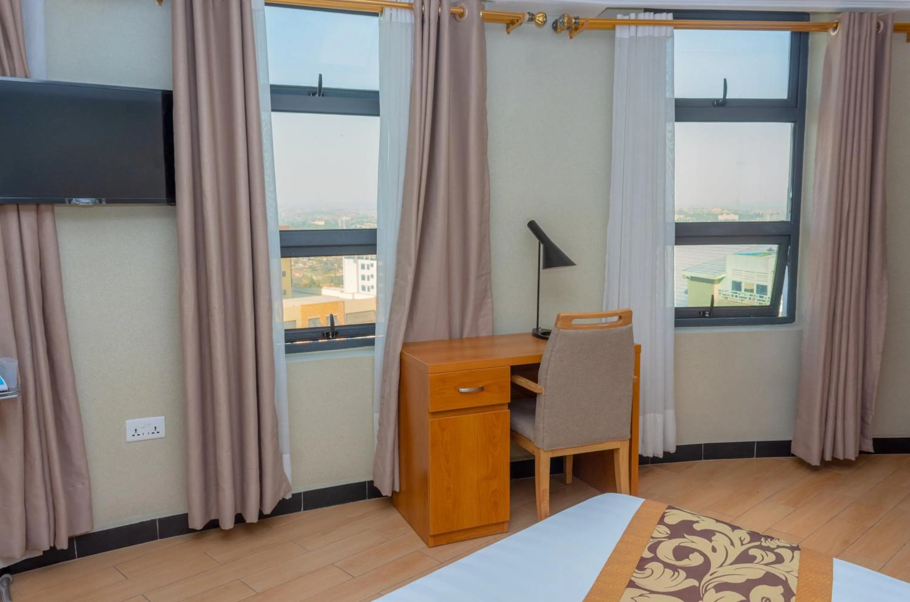 Bedroom in Tropical Plaza Apartments