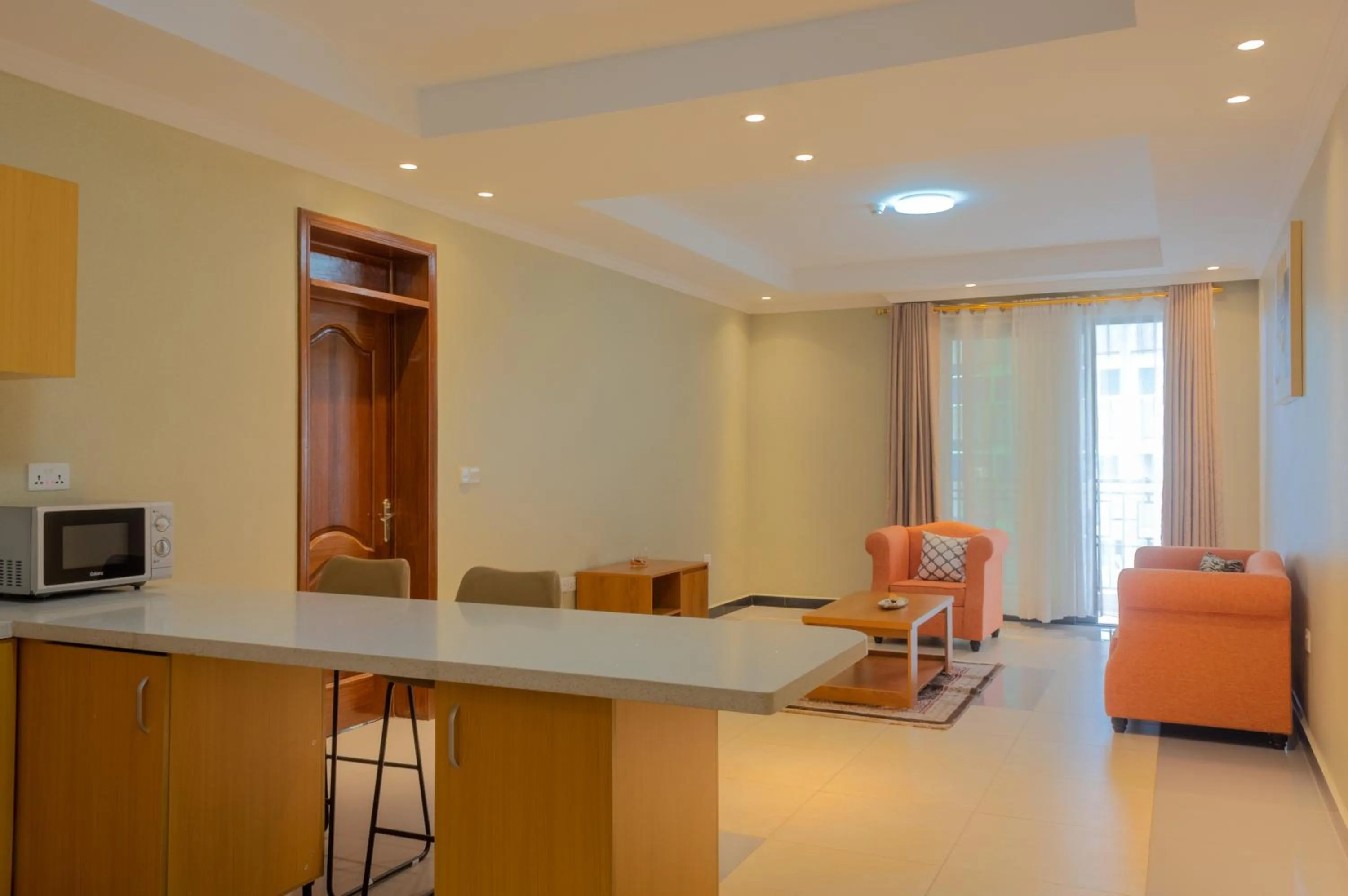 Living room in Tropical Plaza Apartments