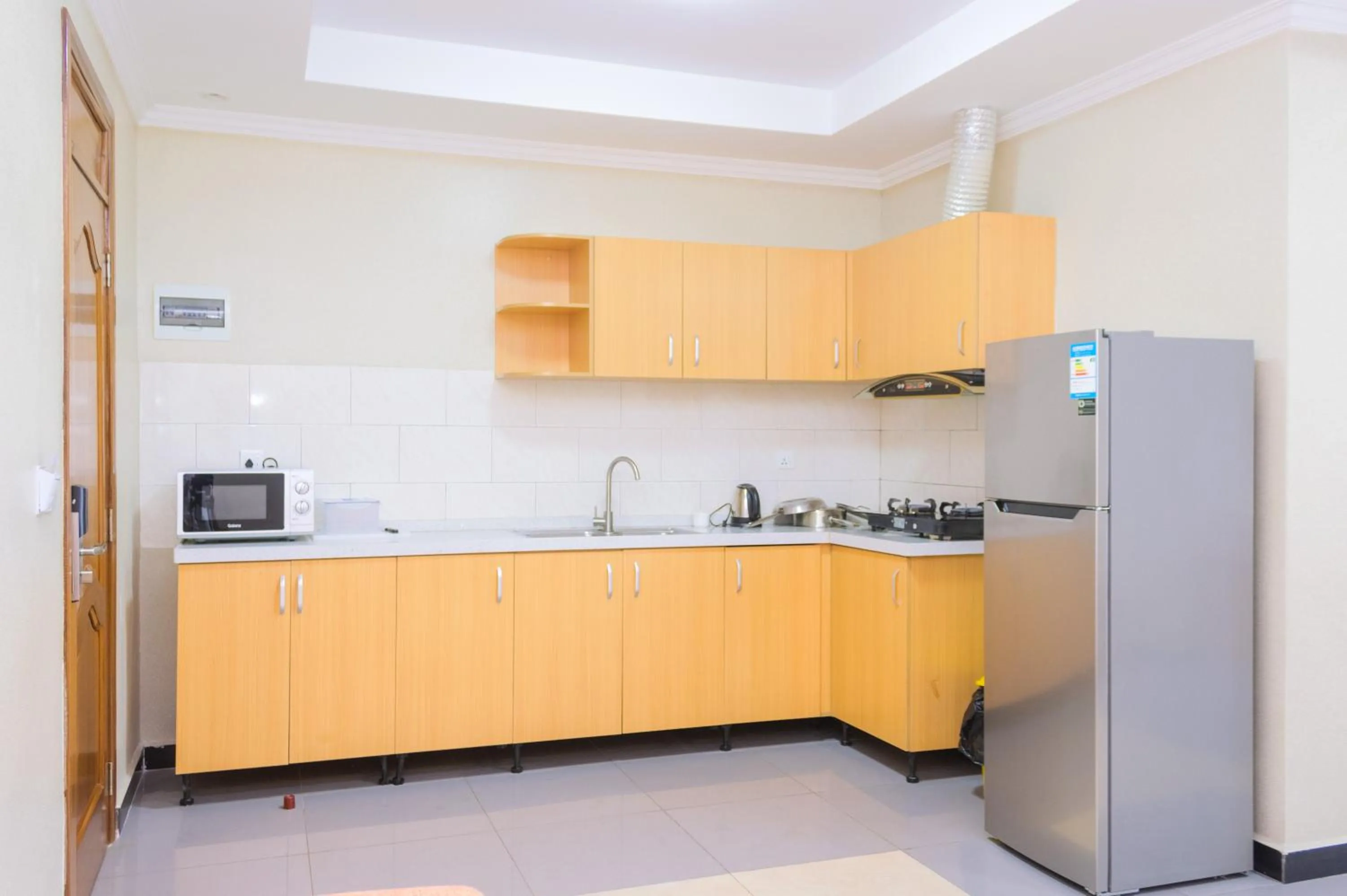 Kitchen or kitchenette in Tropical Plaza Apartments