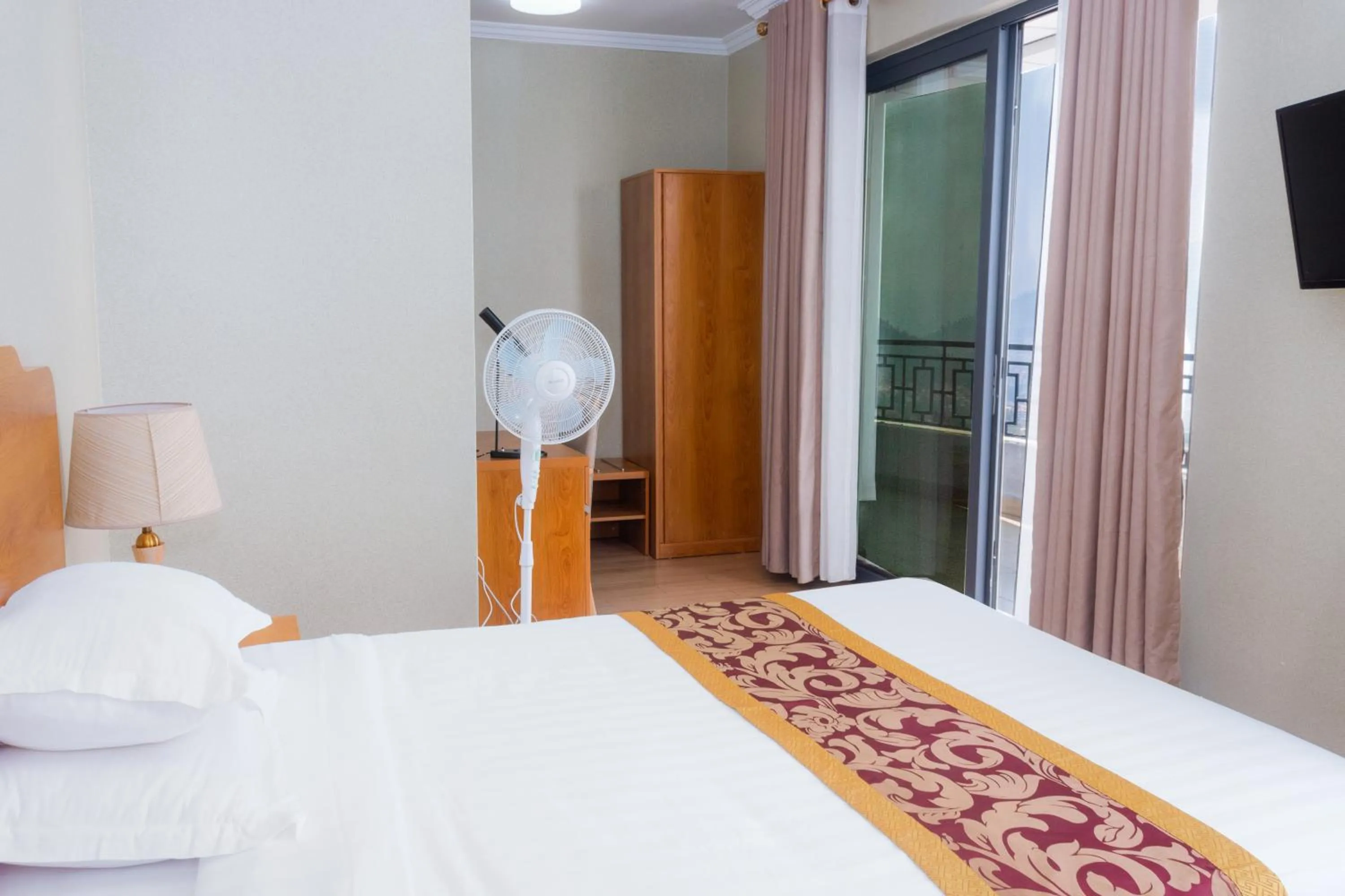 Bedroom in Tropical Plaza Apartments