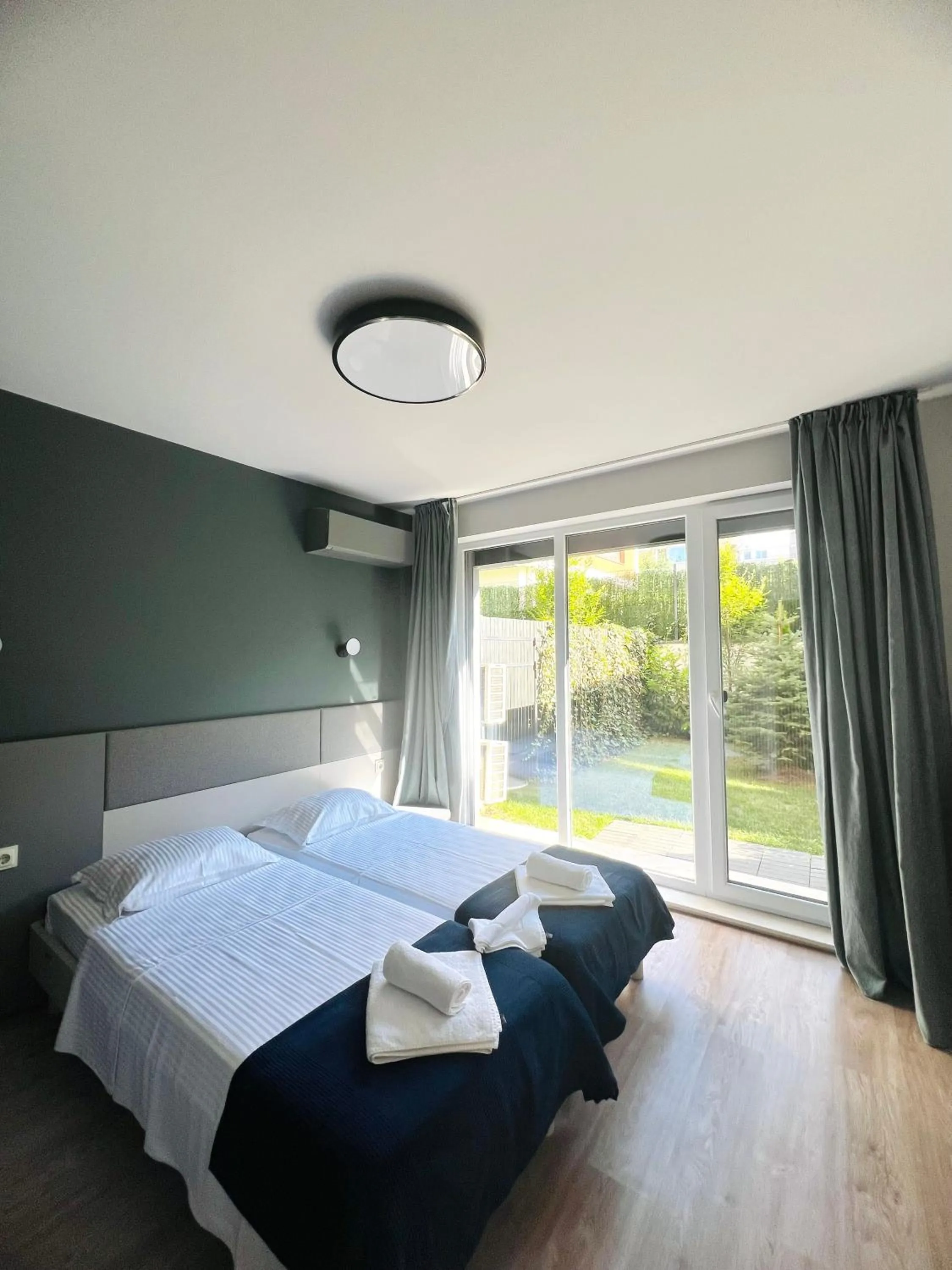 Bed in 7th Sense boutique apartments