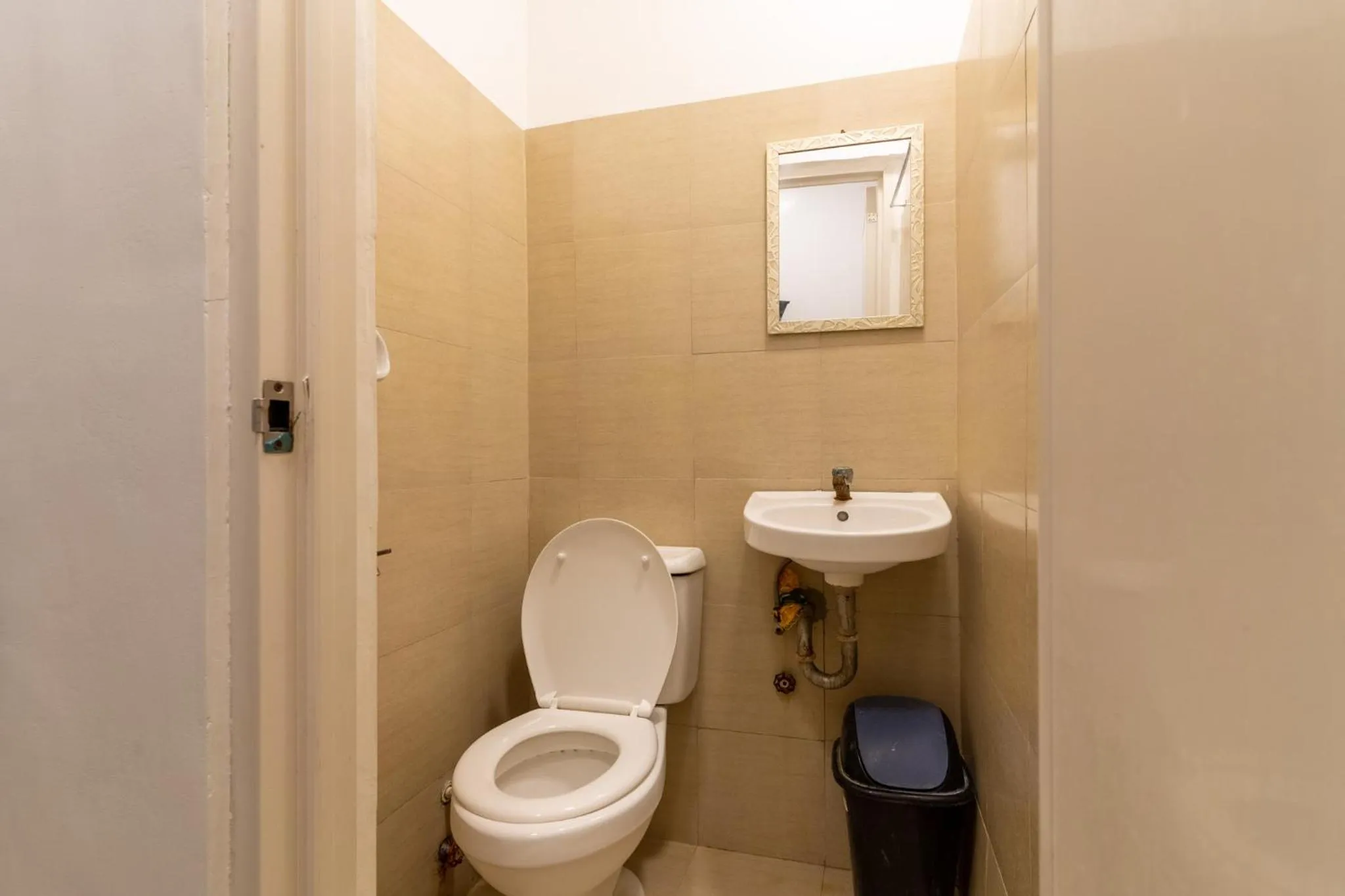 Toilet in Bamboo Paraiso Resort at Bolo Beach