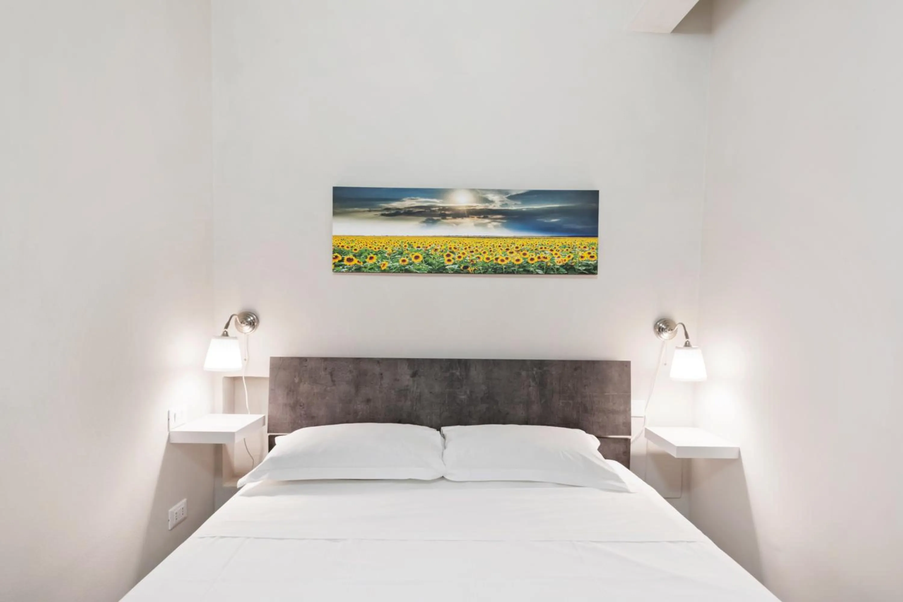 Bed in La Loggia della Signoria Charming Loft