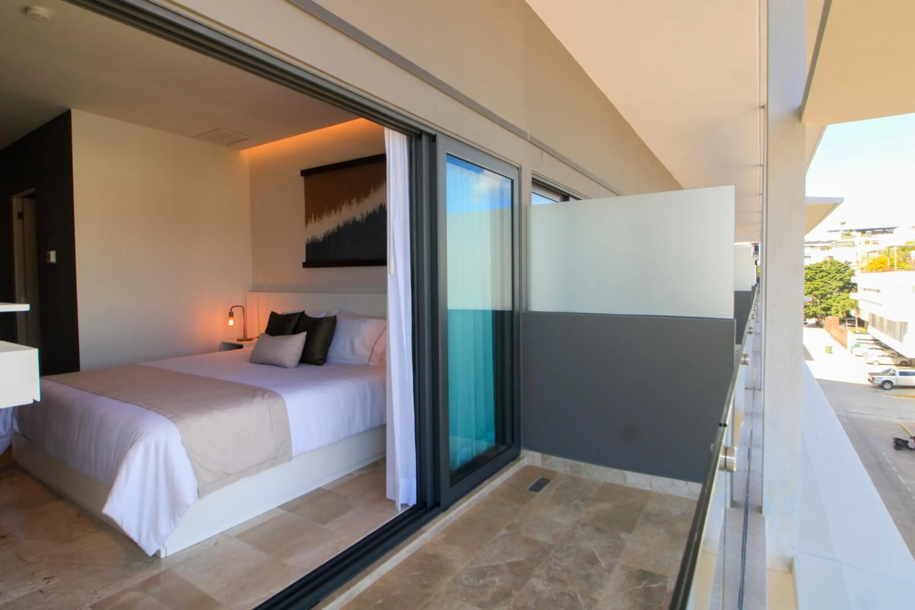 Bed in Singular Dream Vacation Rentals