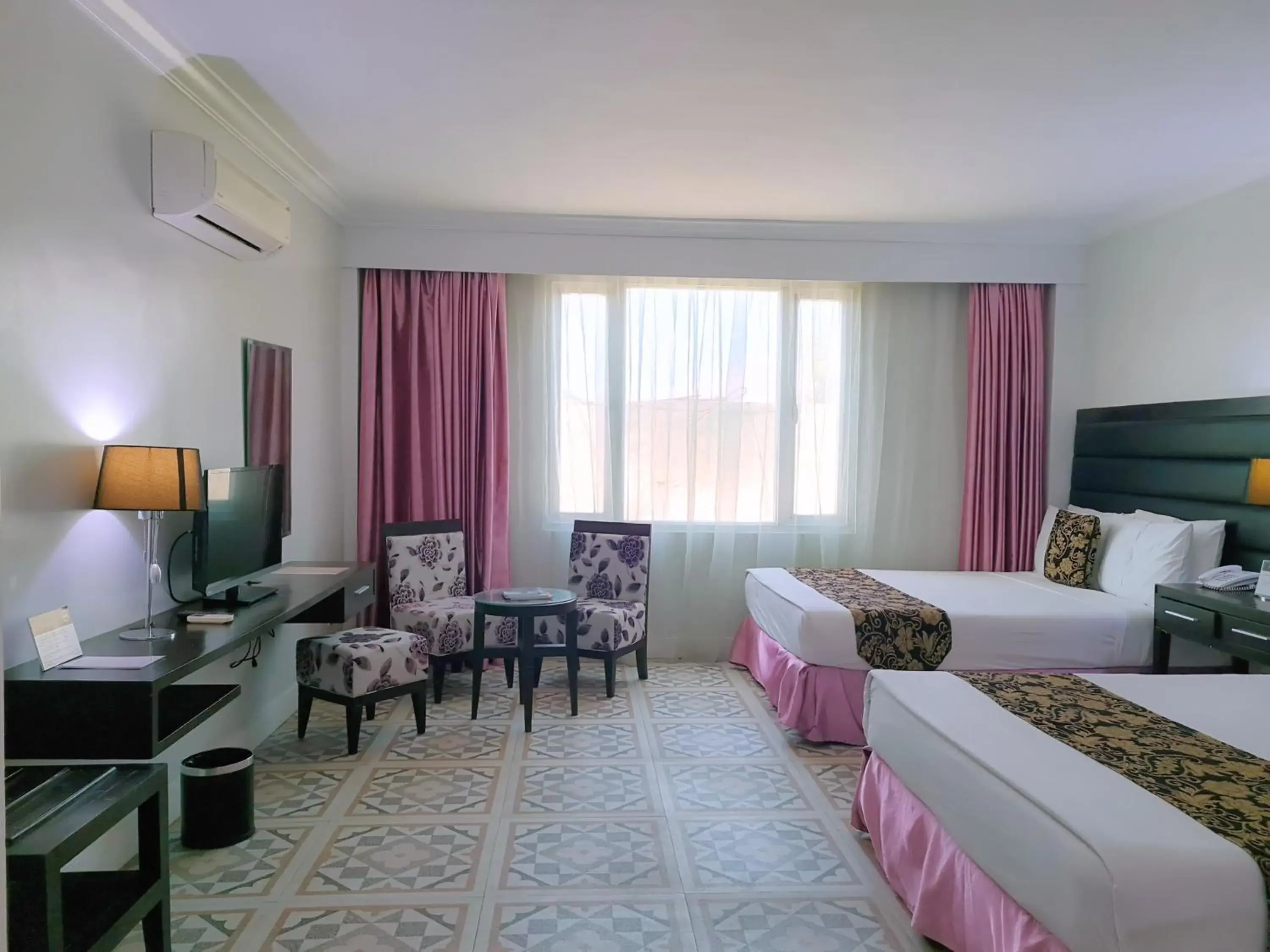 Photo of the whole room, Bed in Fiesta Garden Hotel Photo of the whole room, Bed in Fiesta Garden Hotel