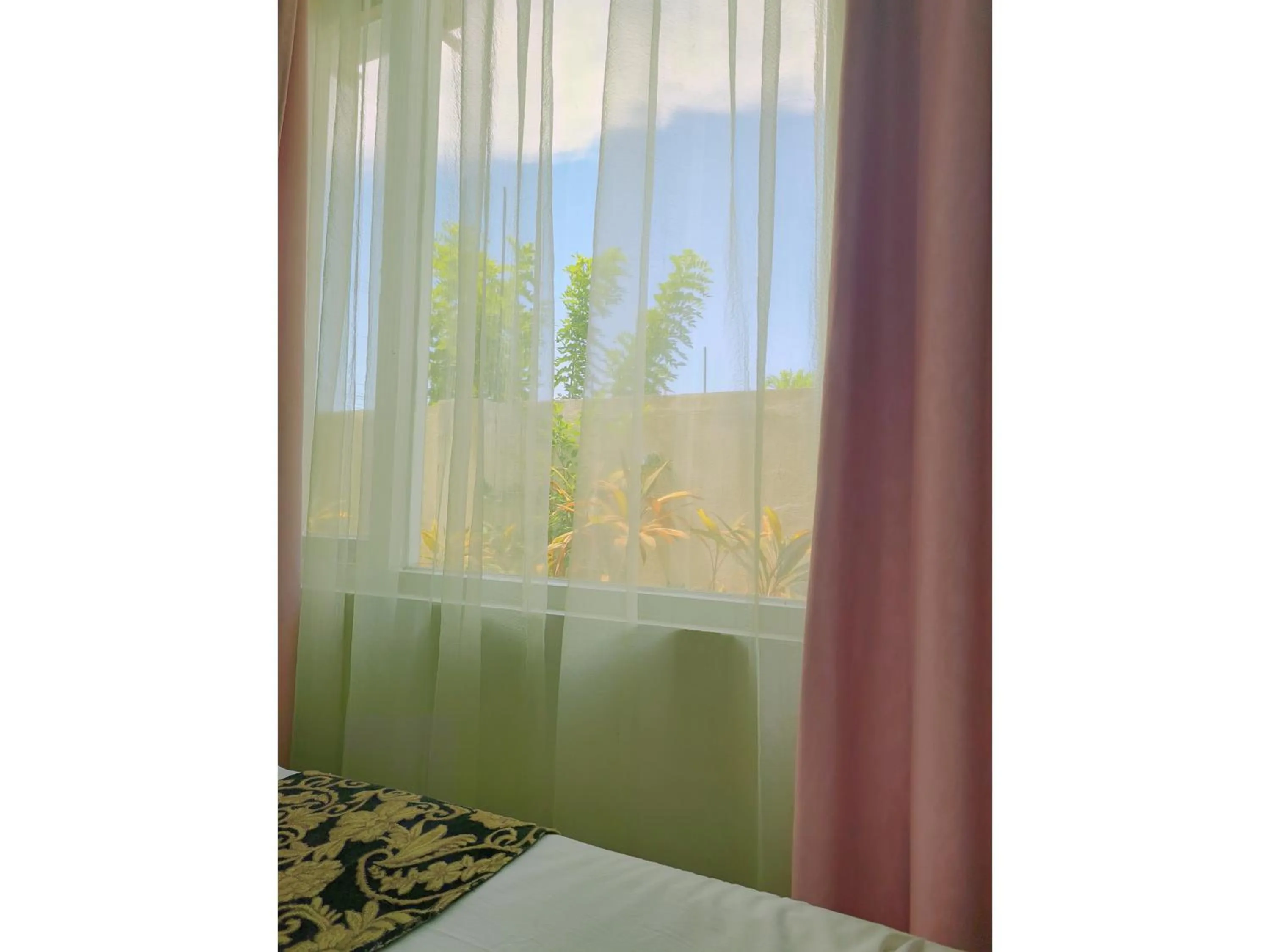 View (from property/room), Bed in Fiesta Garden Hotel