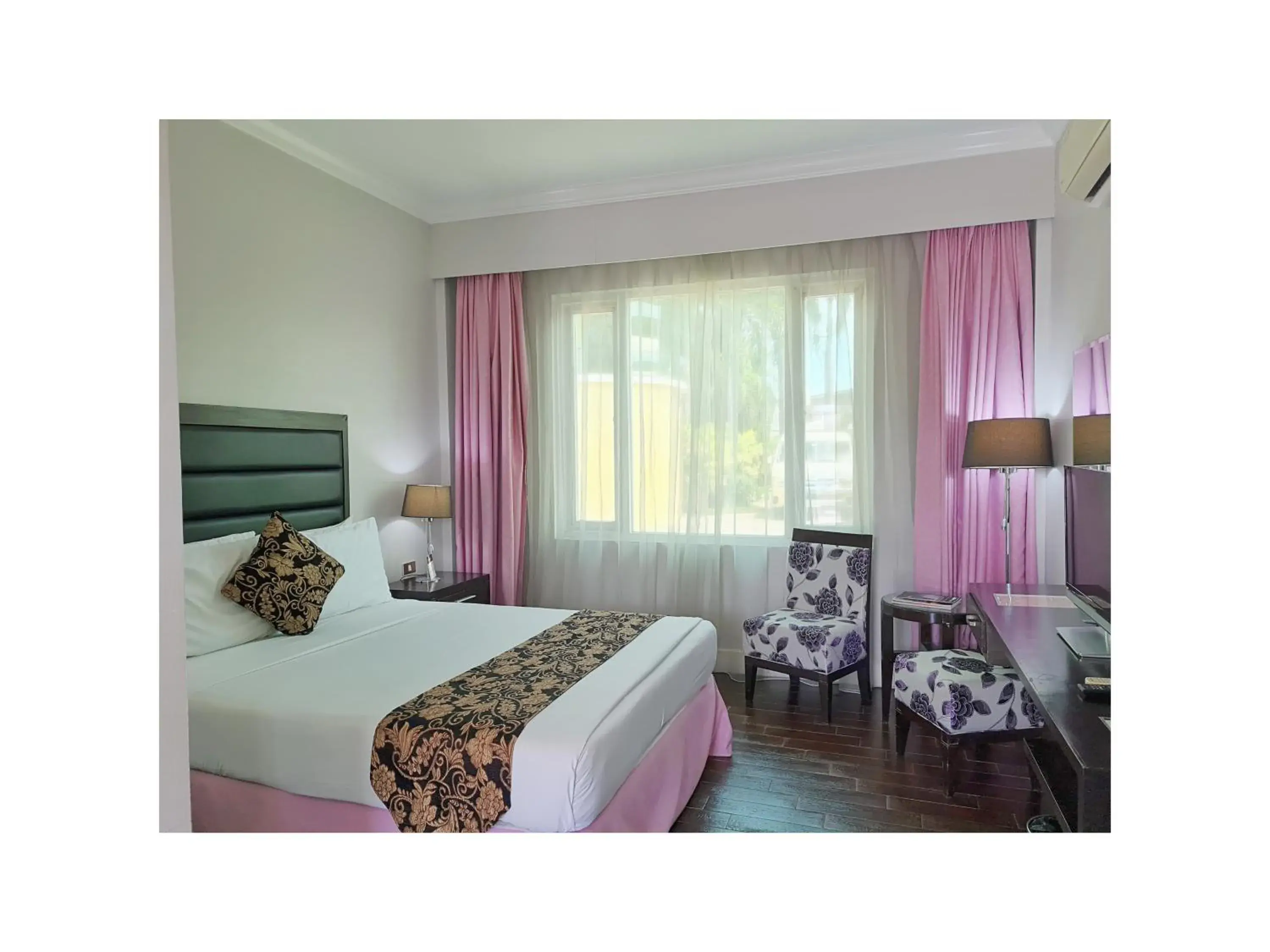 Bed in Fiesta Garden Hotel Bed in Fiesta Garden Hotel