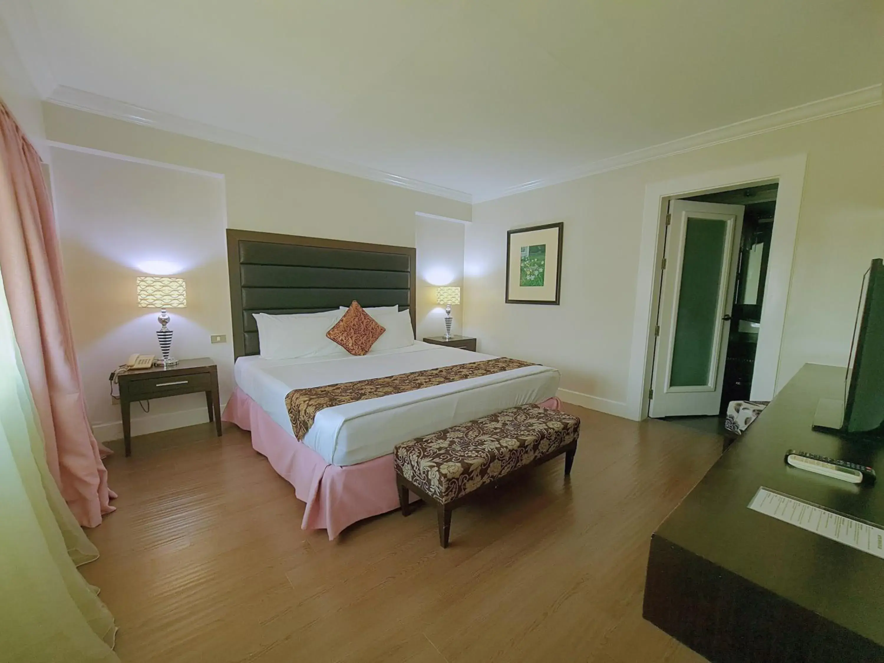 Bed in Fiesta Garden Hotel Bed in Fiesta Garden Hotel