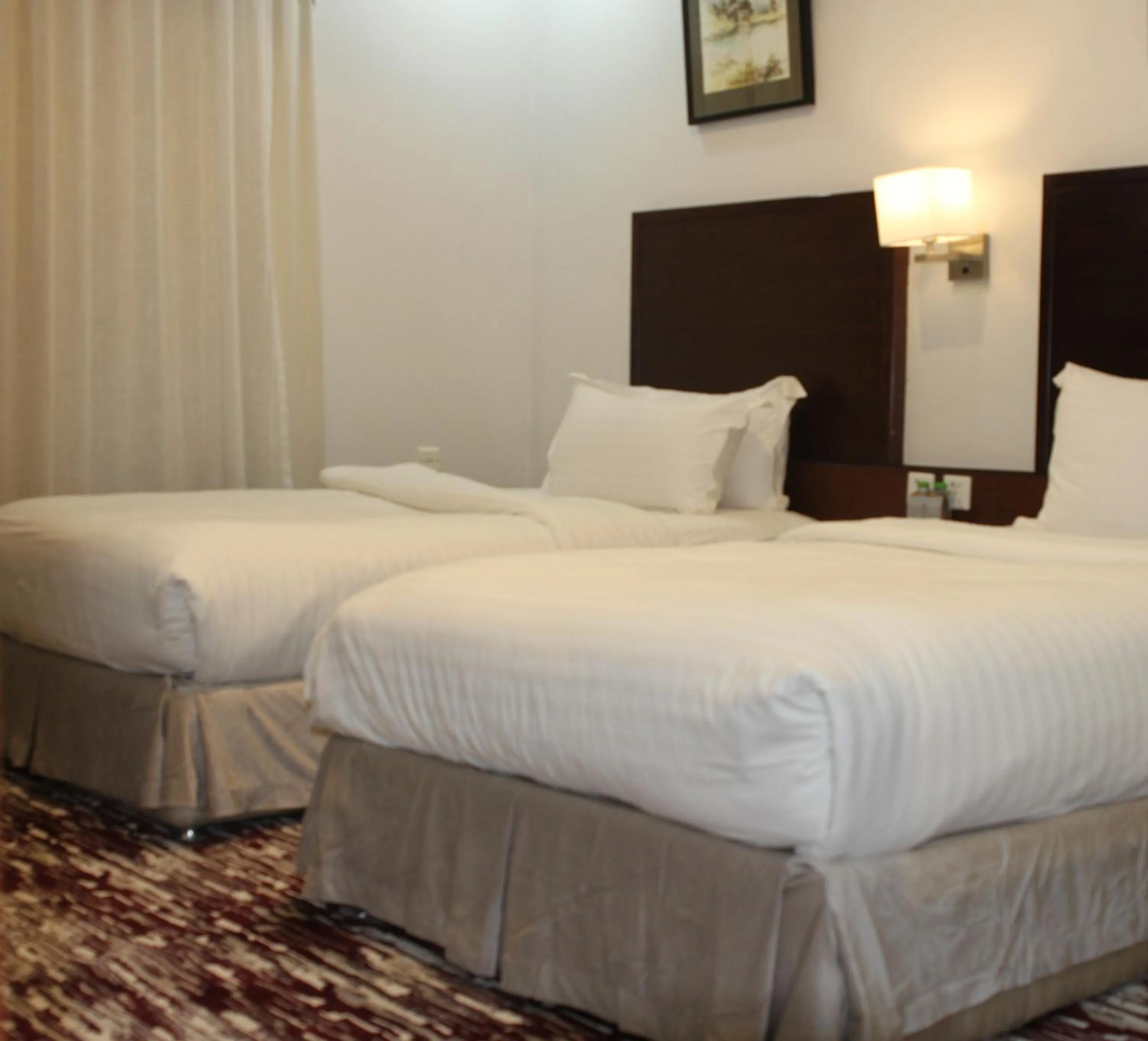 Bed in Carawan Al Khaleej Hotel Olaya