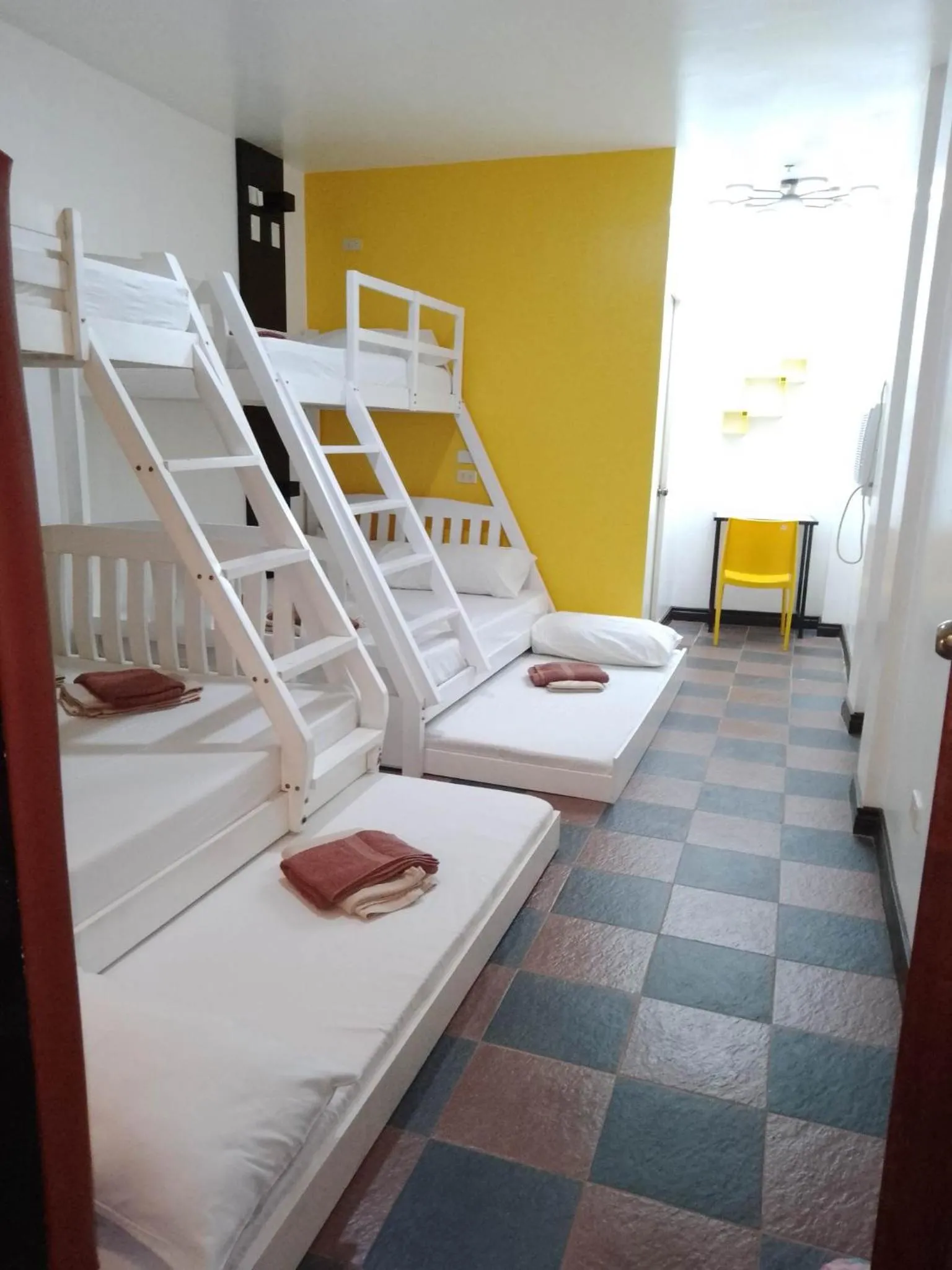 Bed in Corazon Tourist Inn