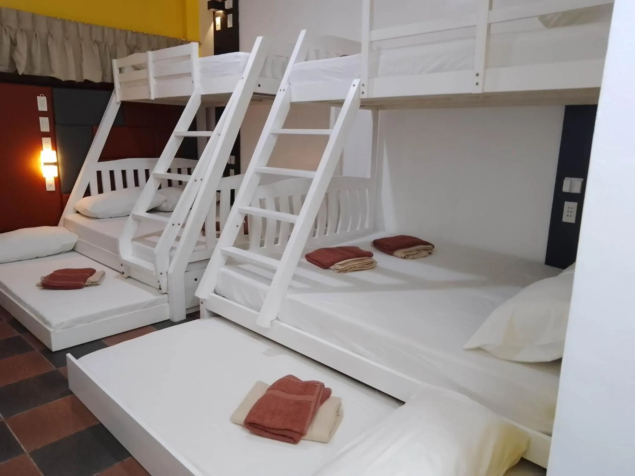 Bed in Corazon Tourist Inn