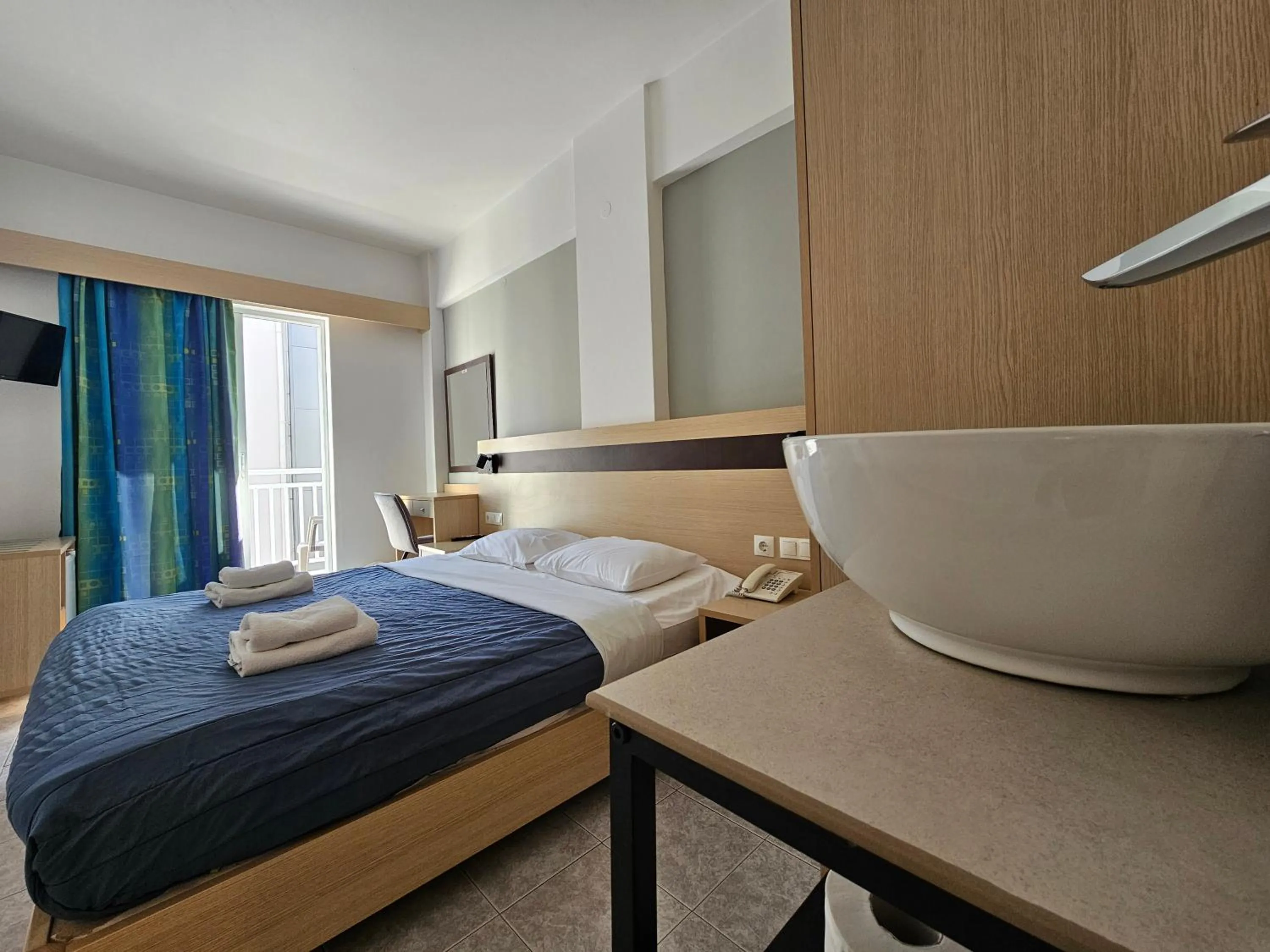 Bed in G92 City Hotel