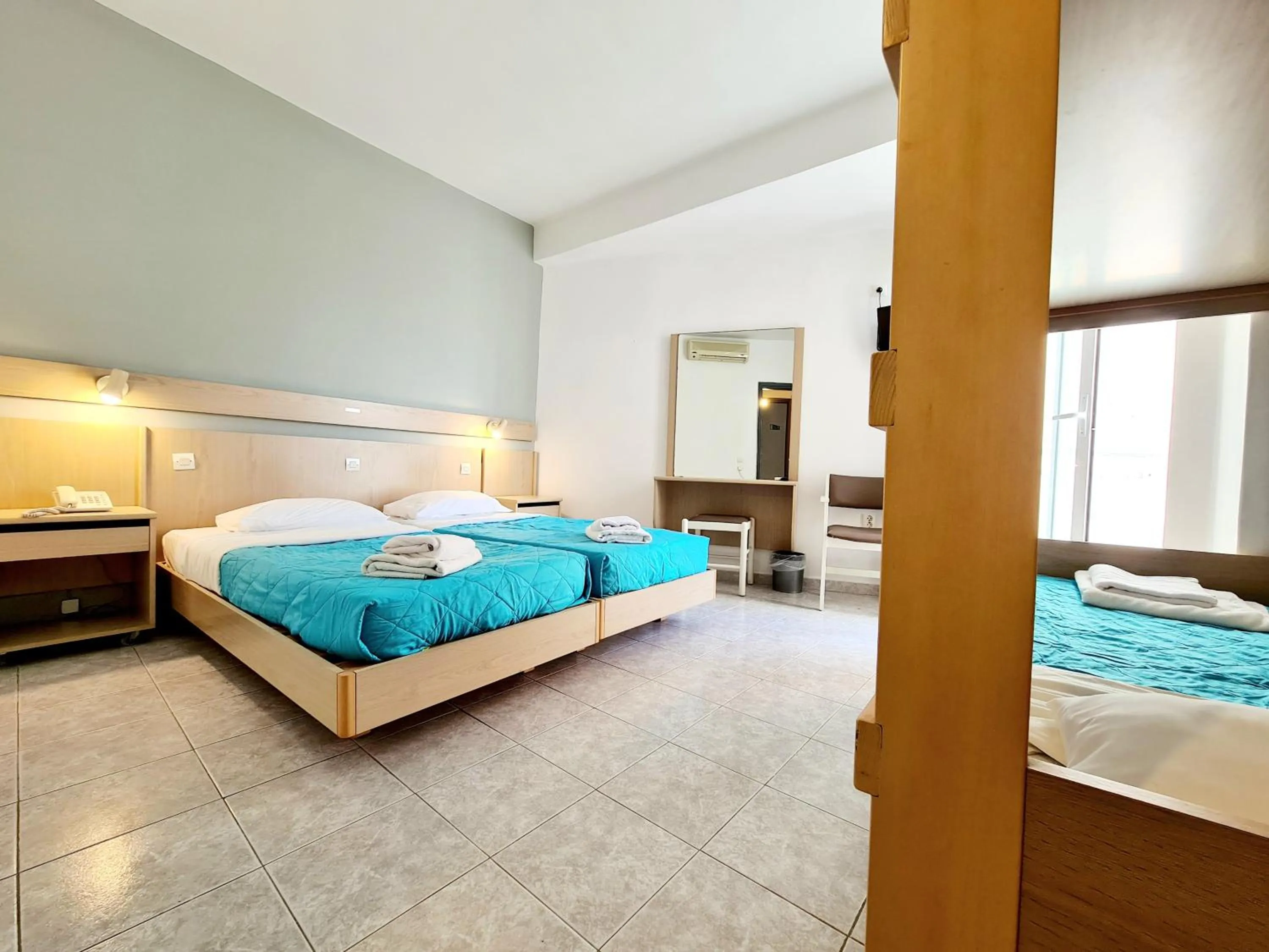 Bed in G92 City Hotel